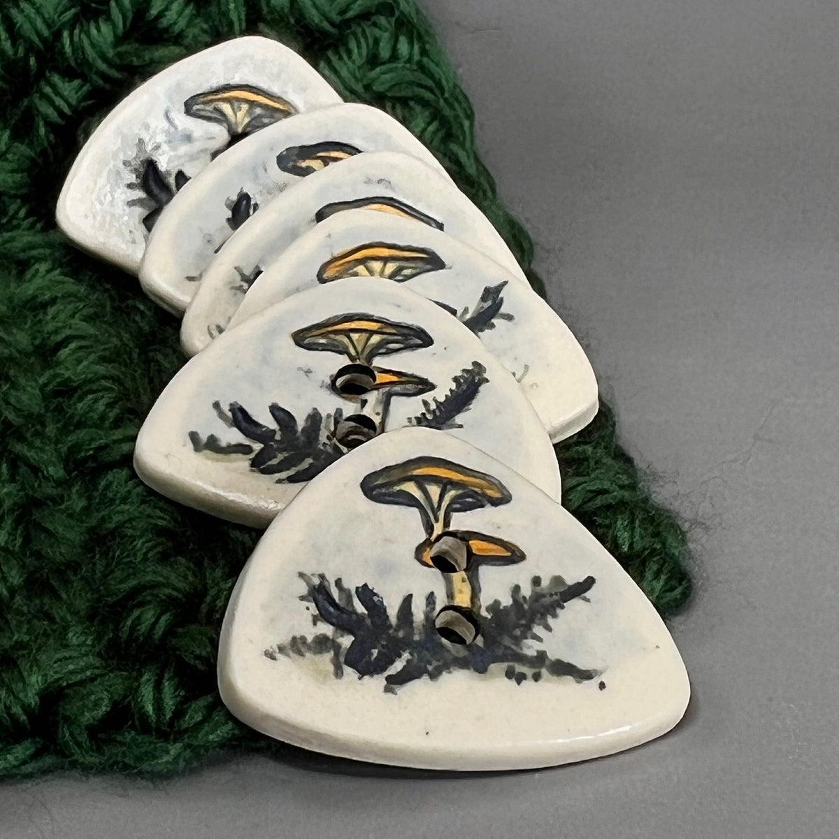 Yellow Cap Woodland Mushroom with Ferns on White Triangular Button