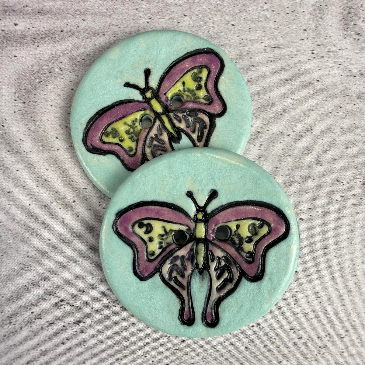 Red Violet Moth with Yellow on Aqua Blue Ceramic Button