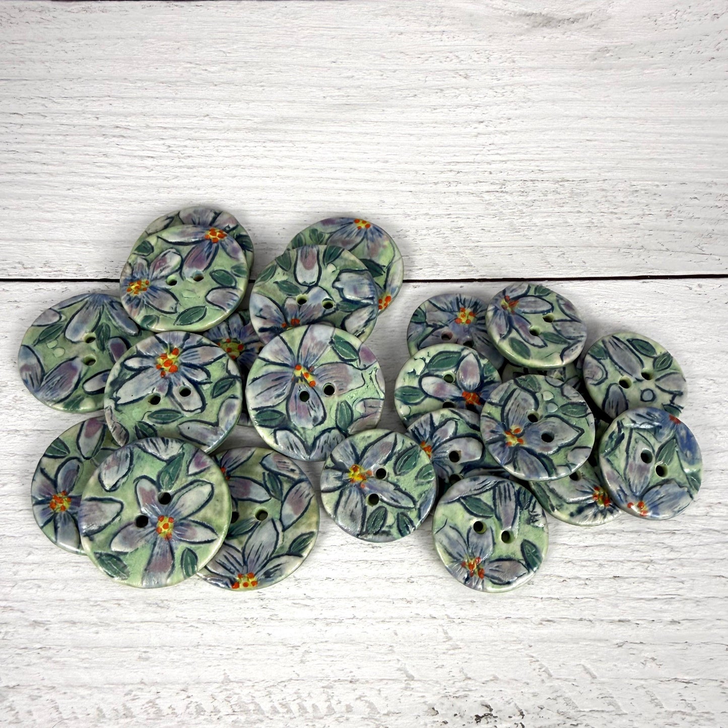 Small Purple Flowers on Green Round Buttons