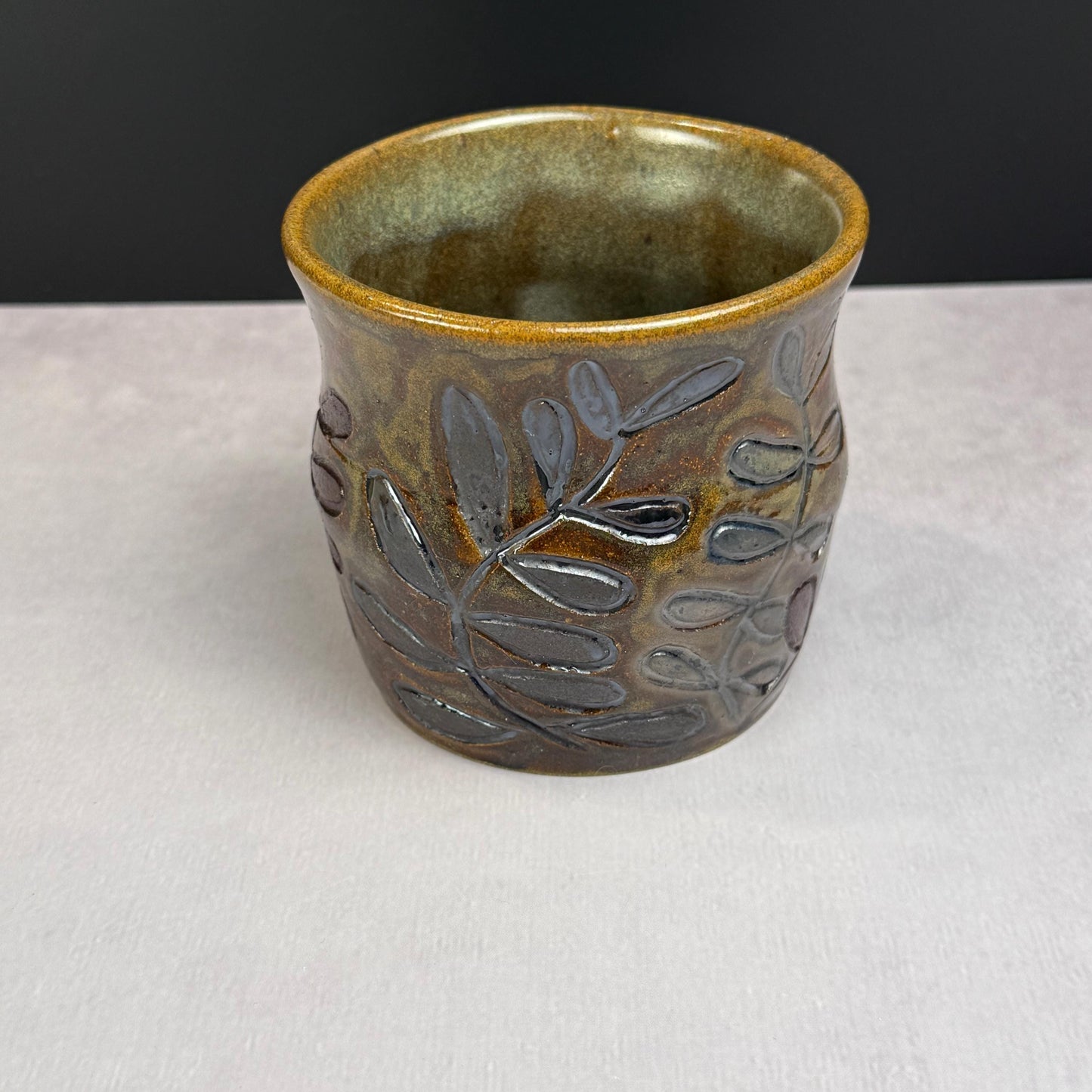 Brown Leaves on a Brown and Green Stoneware Pot/Desk Caddy