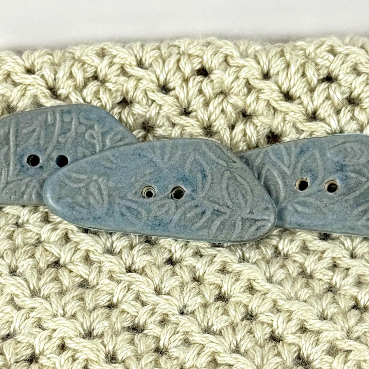 Blue Matte Triangular Button with Flower and Plant Texture