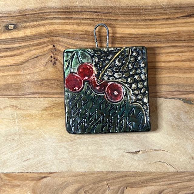 Red Berries and Textures in Black Ceramic Pendants
