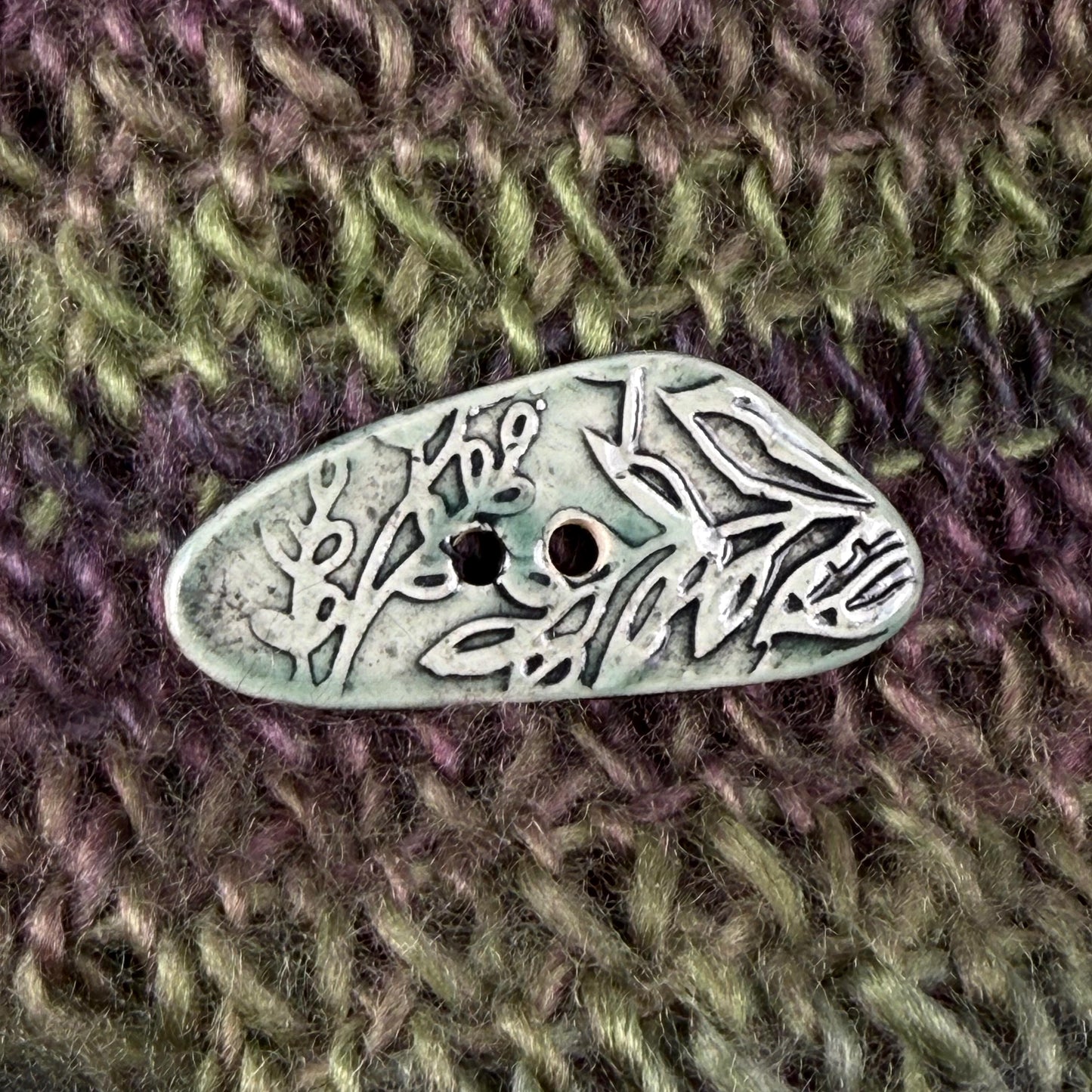 Green Washed Triangular Button with Flower and Plant Texture