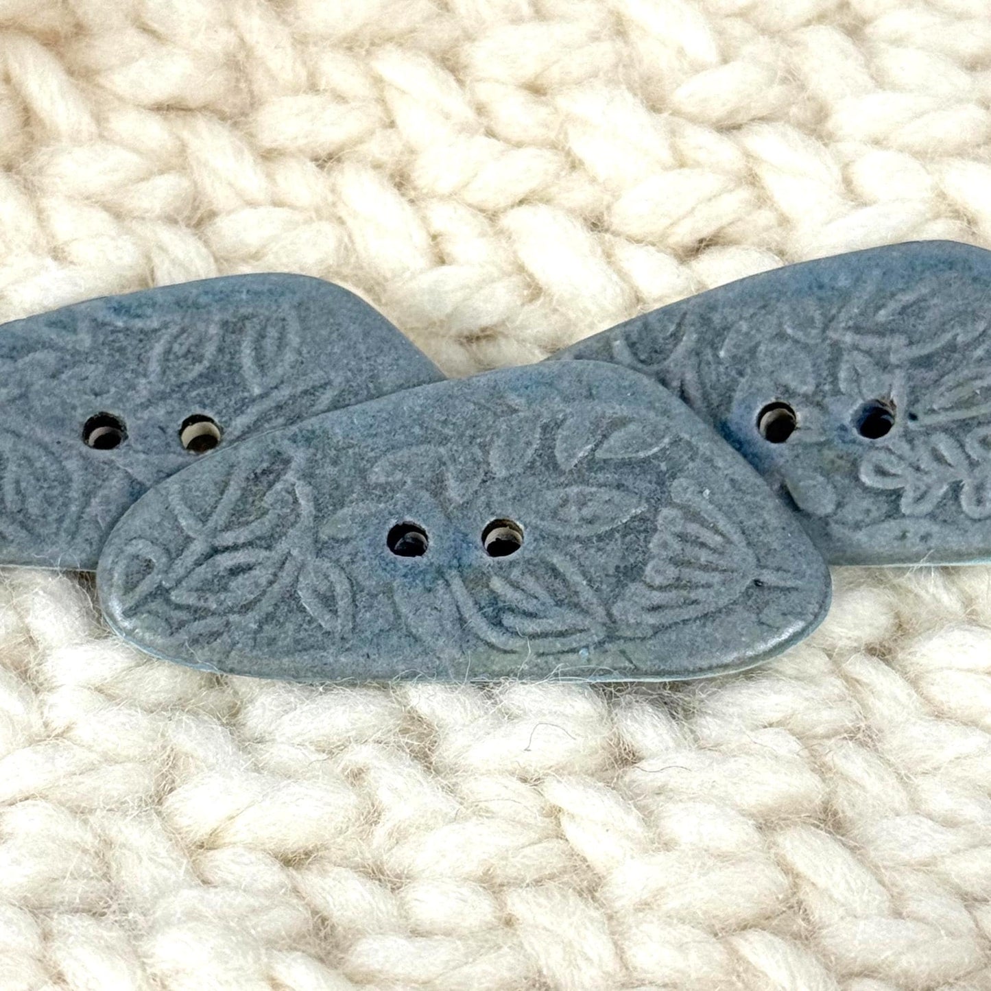 Blue Matte Triangular Button with Flower and Plant Texture