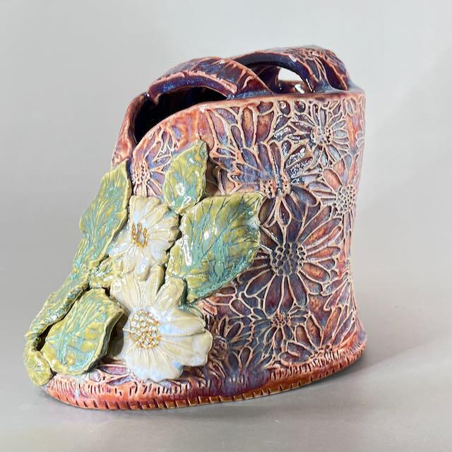 Pink and Purple Flower Brick/Vase with White  Flowers and Green Leaves