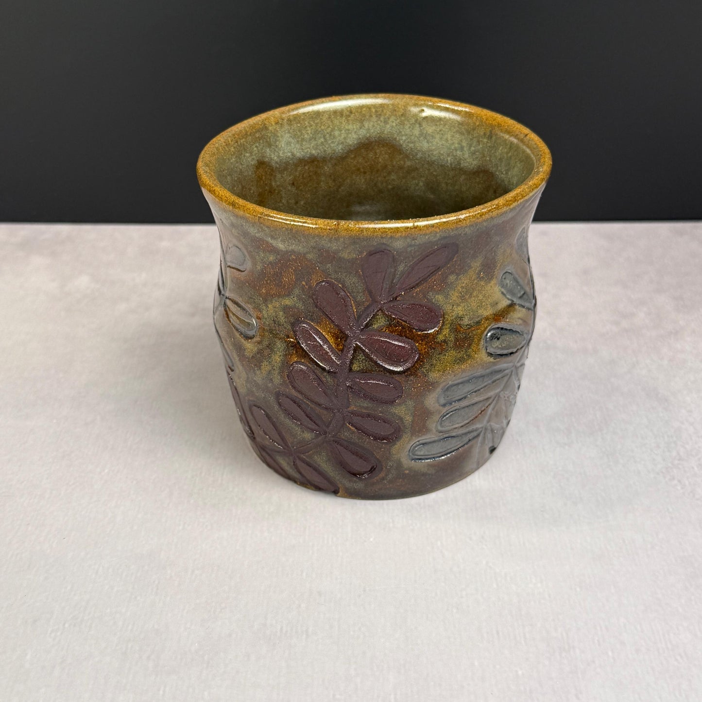 Brown Leaves on a Brown and Green Stoneware Pot/Desk Caddy