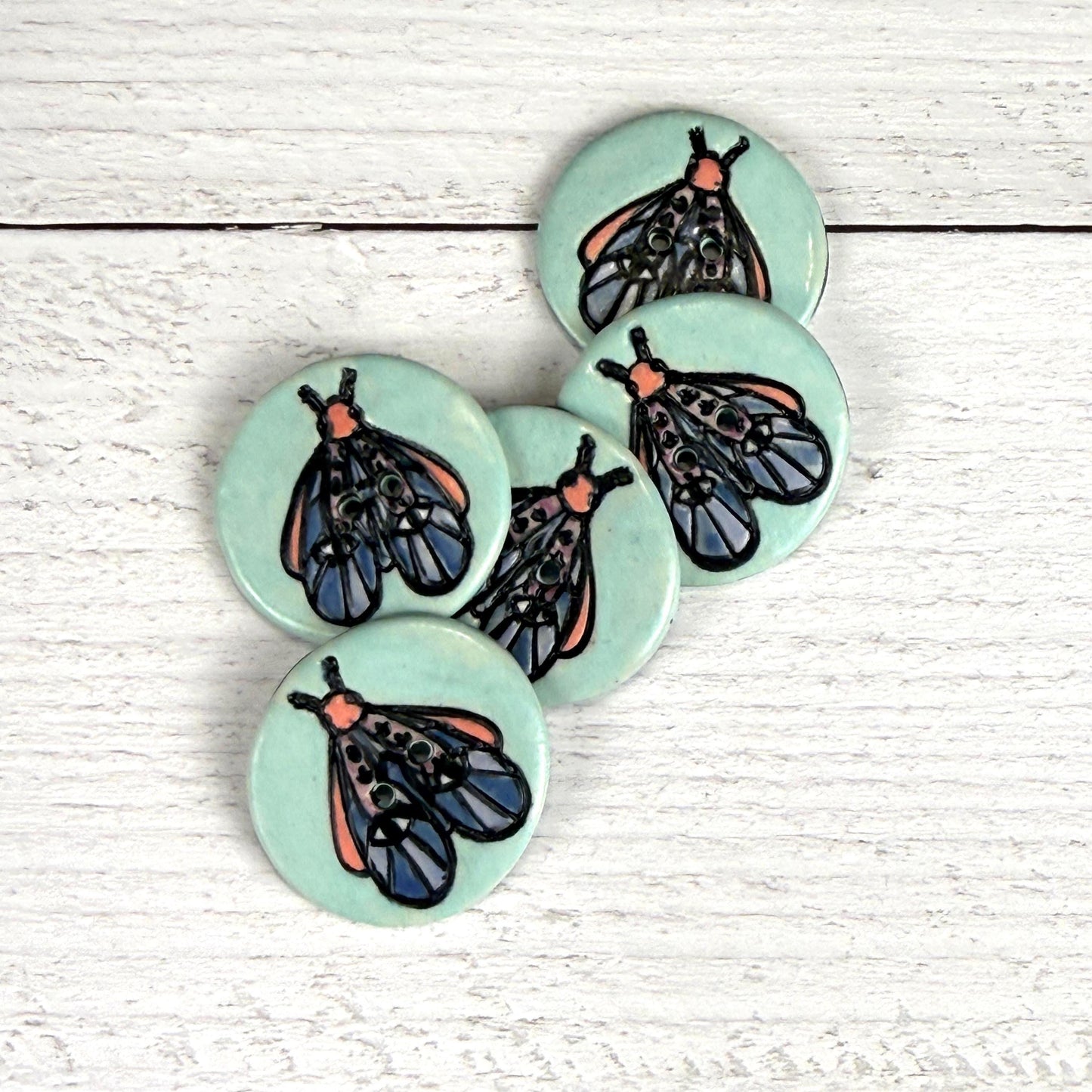 Blue Moth with Eyes on  Aqua Blue Ceramic Button