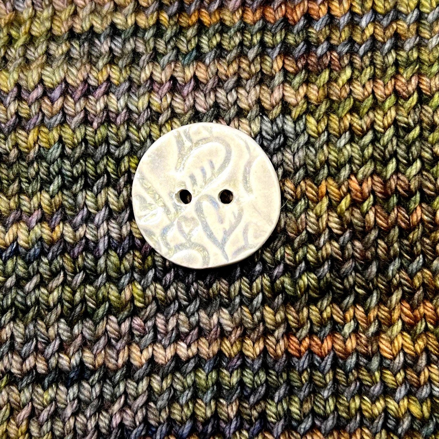 4 White Round Buttons with Light Gray Heart Pattern