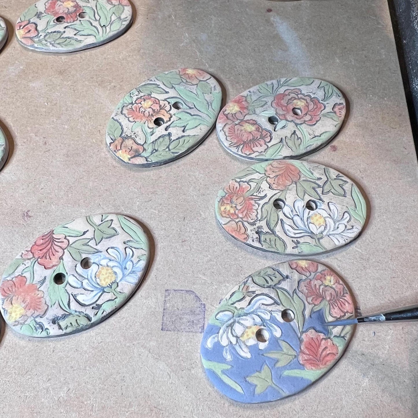 Cottage Garden Flowers on Blue Oval Buttons