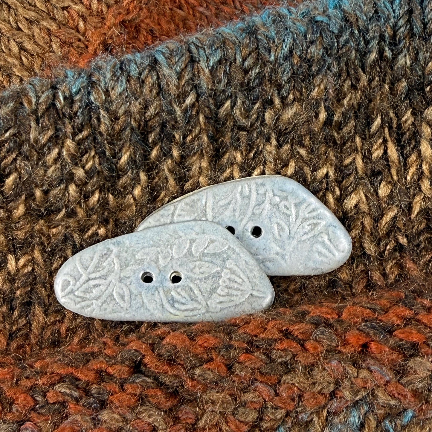 Blue Matte Triangular Button with Flower and Plant Texture