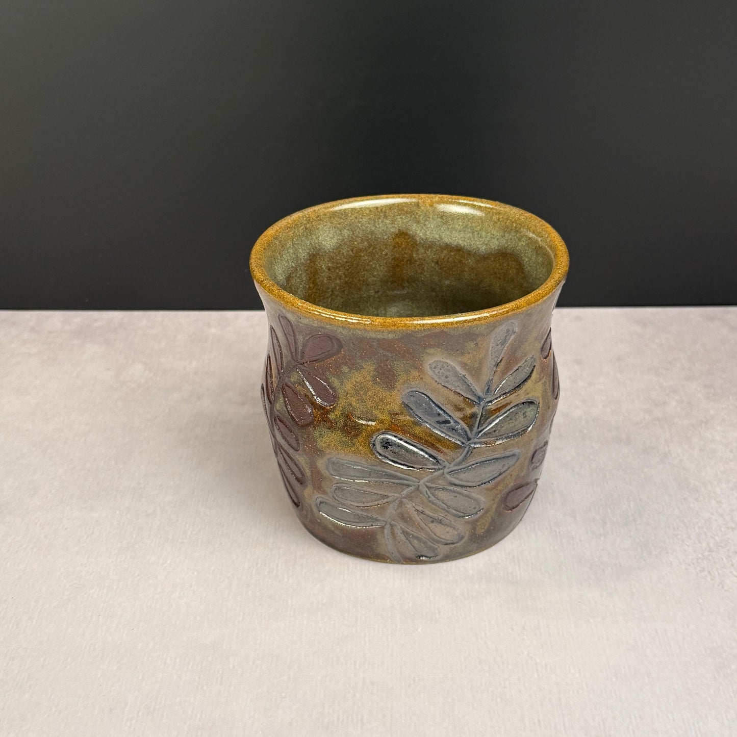 Brown Leaves on a Brown and Green Stoneware Pot/Desk Caddy