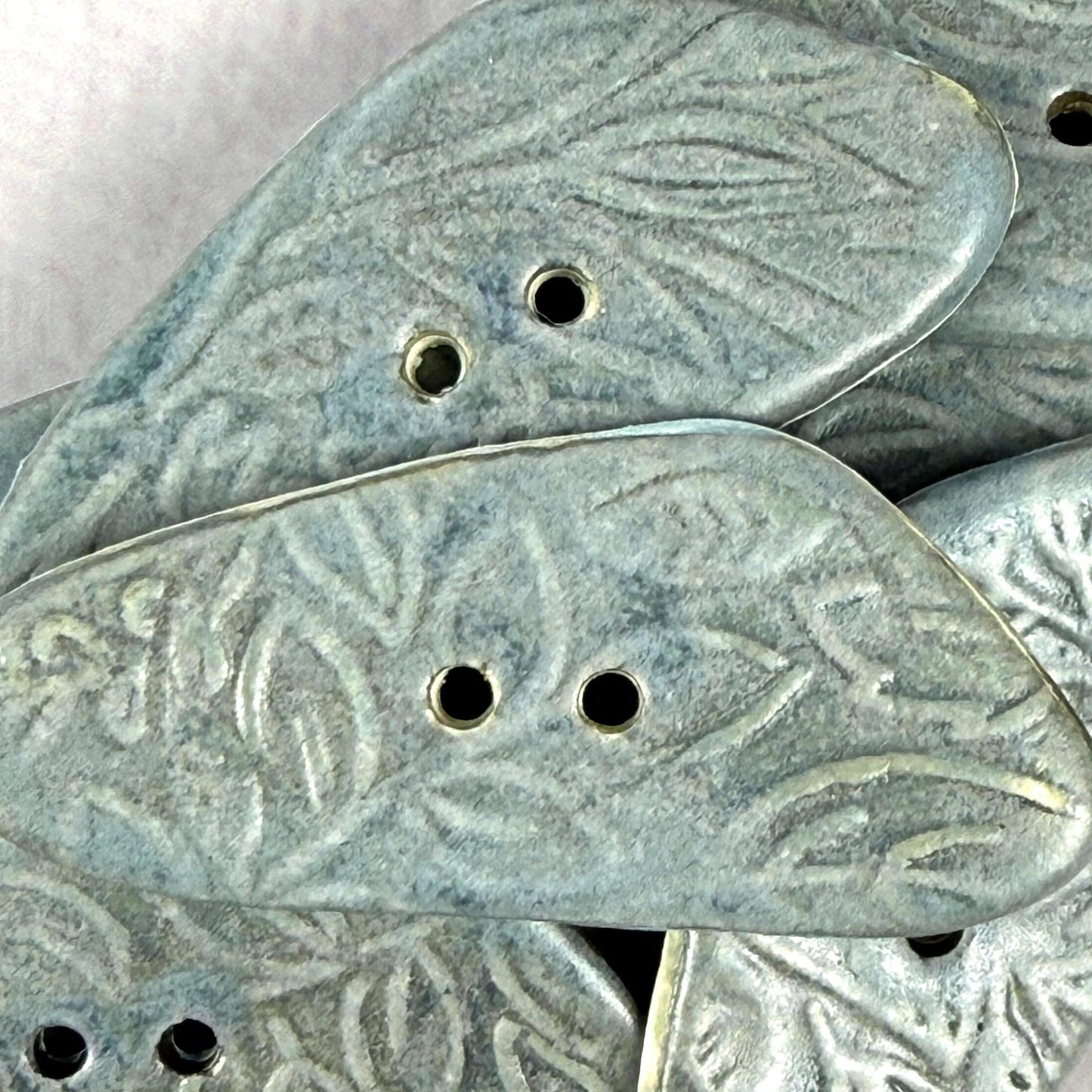 Blue Matte Triangular Button with Flower and Plant Texture