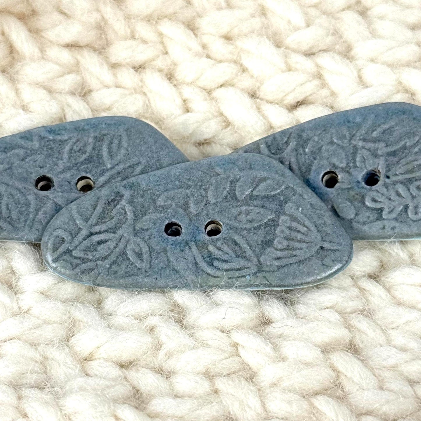 Blue Matte Triangular Button with Flower and Plant Texture