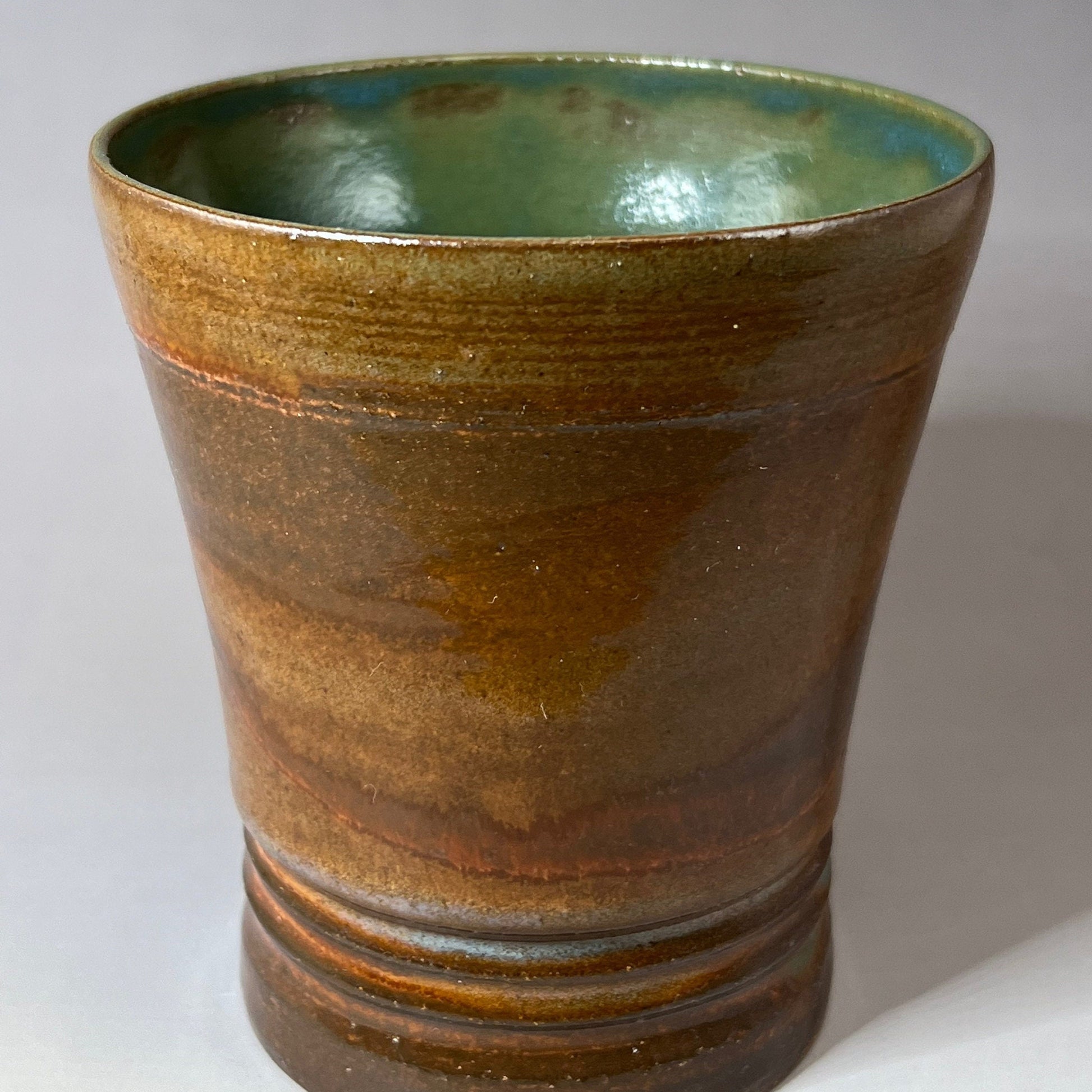Green, Brown, and Blue Brown Stoneware Tumbler