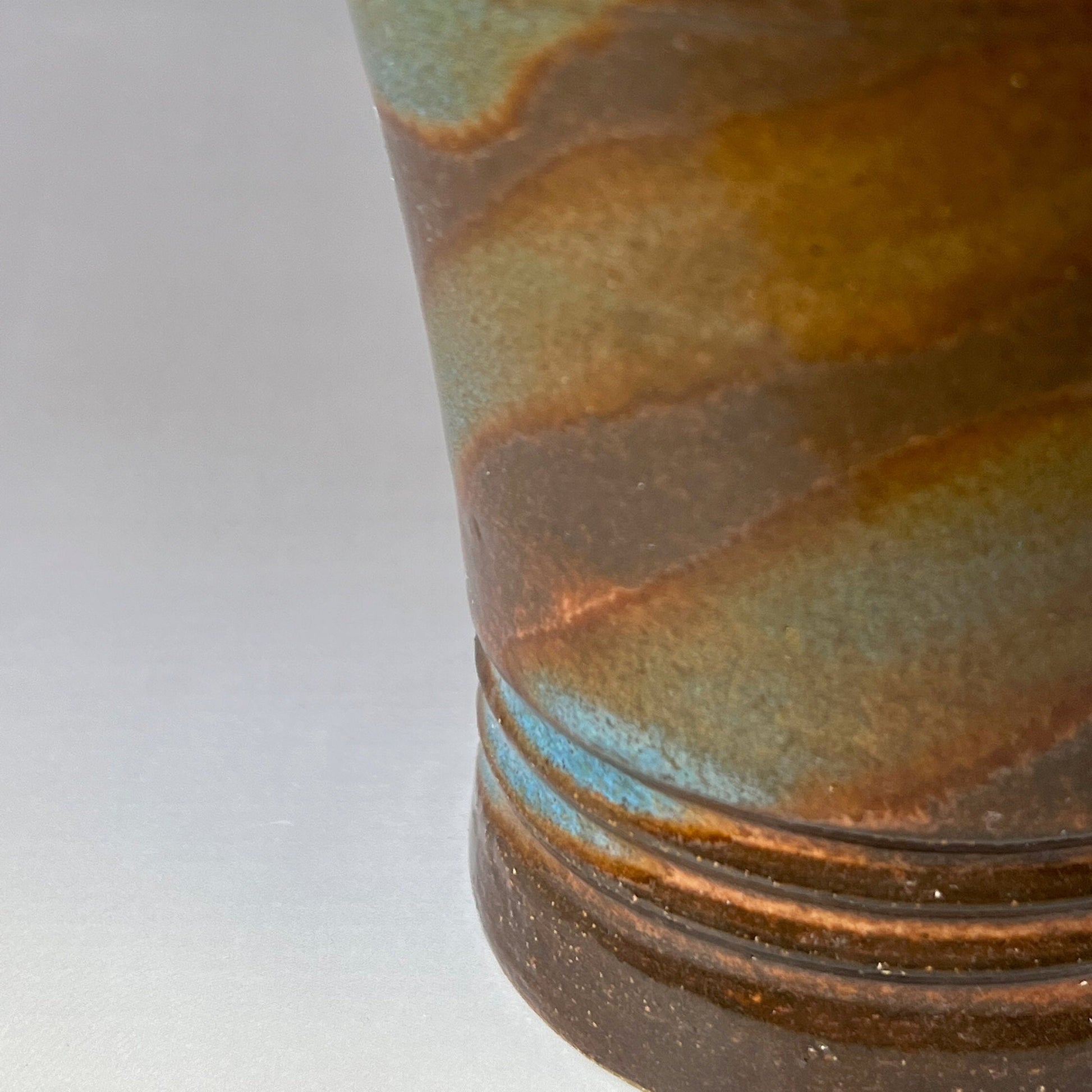 Green, Brown, and Blue Brown Stoneware Tumbler