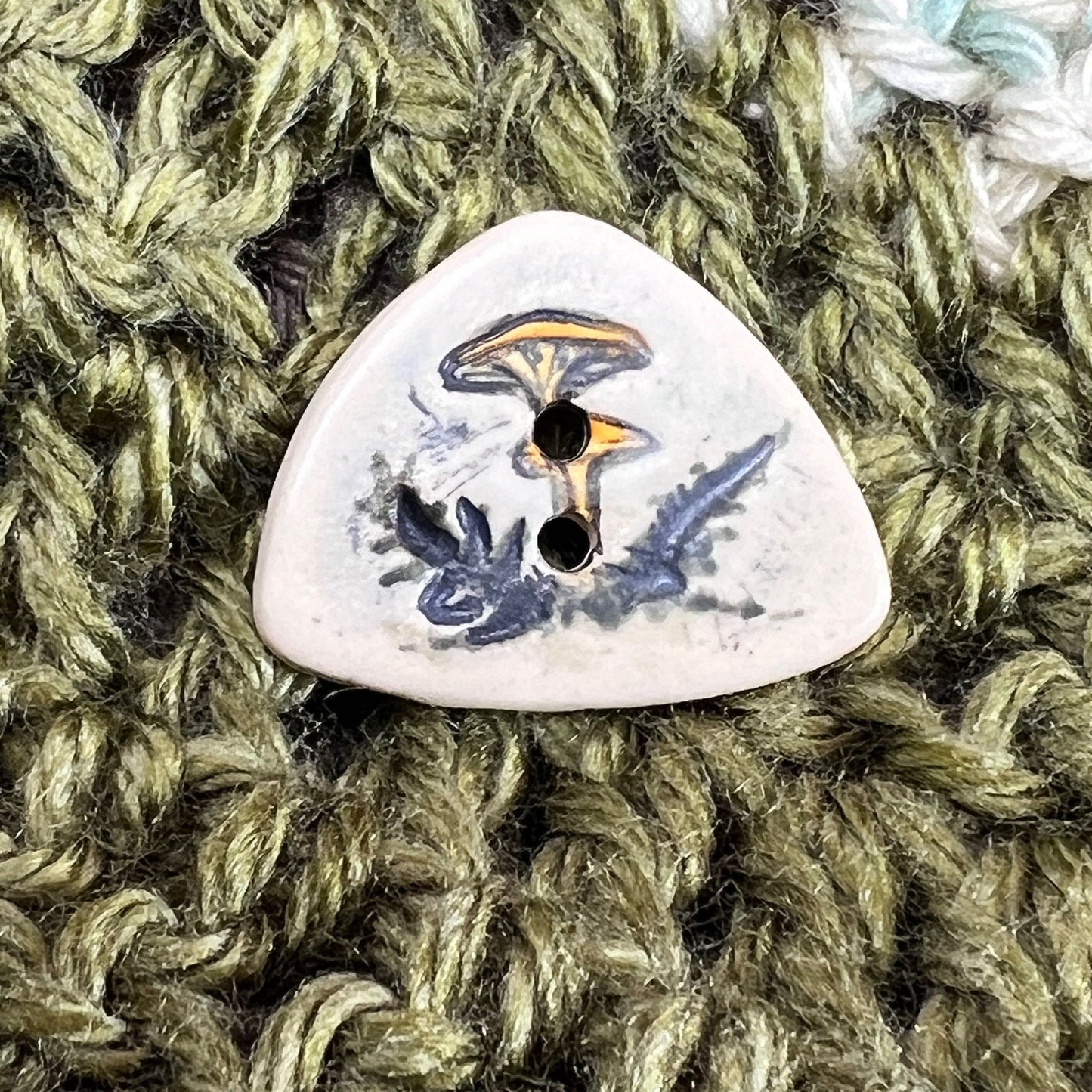 Yellow Cap Woodland Mushroom with Ferns on White Triangular Button