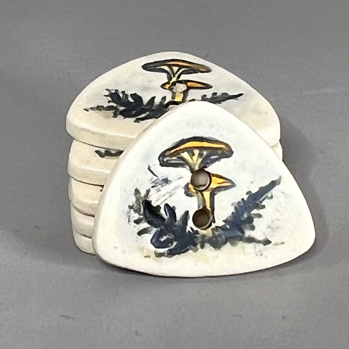 Yellow Cap Woodland Mushroom with Ferns on White Triangular Button