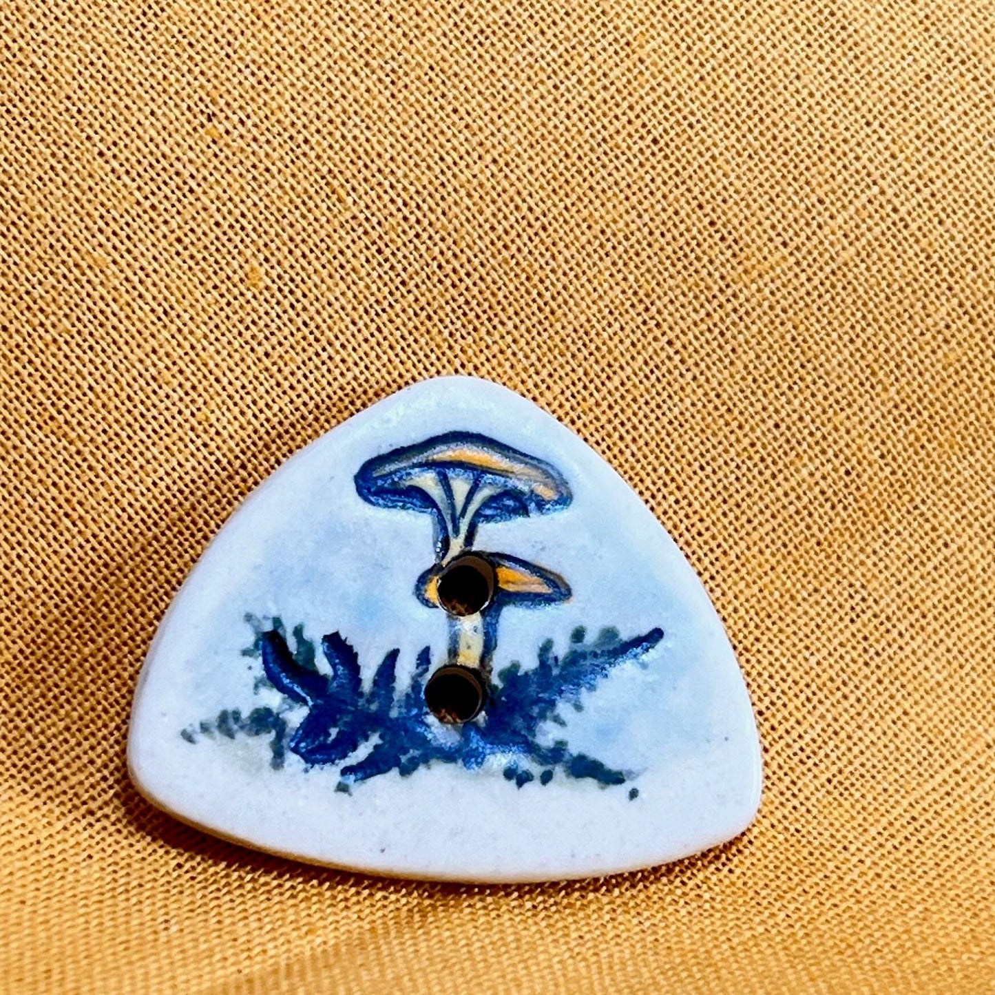 Yellow Cap Woodland Mushroom with Ferns on White Triangular Button