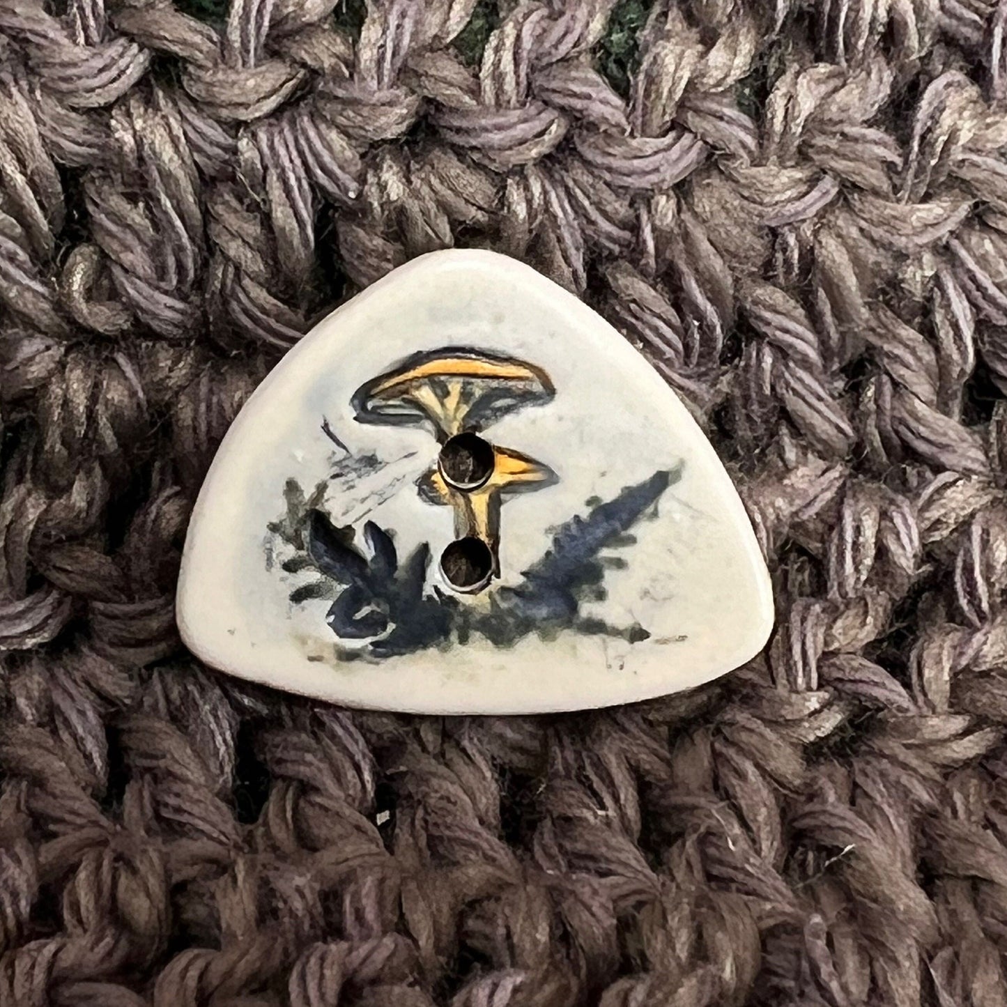 Yellow Cap Woodland Mushroom with Ferns on White Triangular Button