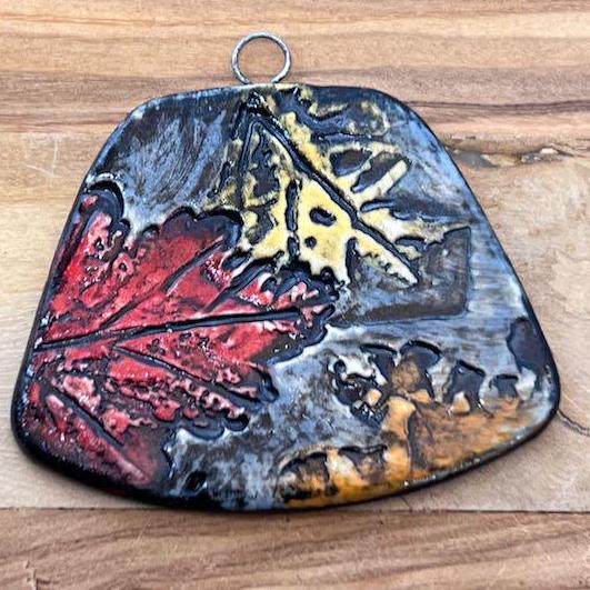 Vivid Fall Leaf Textures in Black Ceramic Pendants