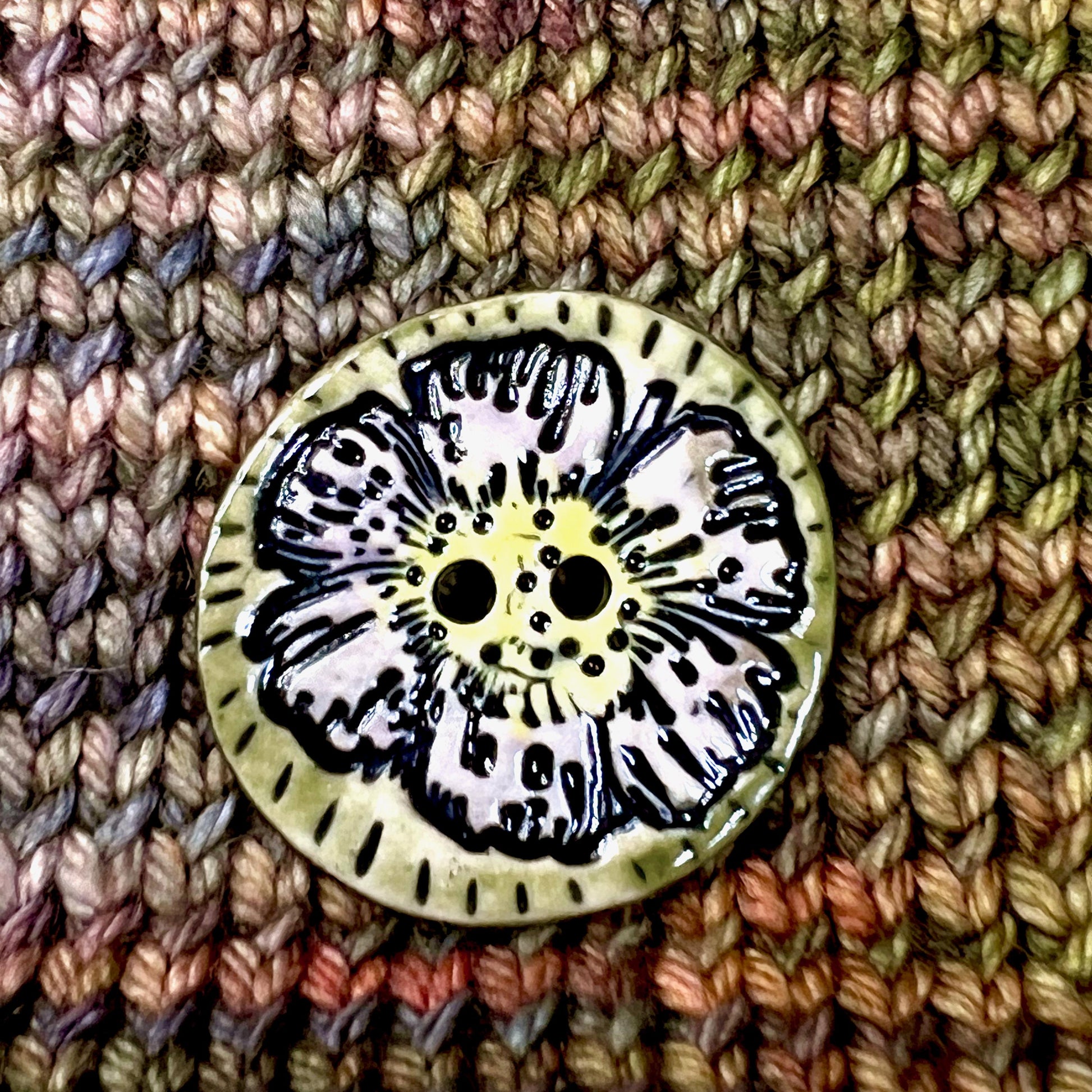Large Button with Light Lavender Flower and Green Border