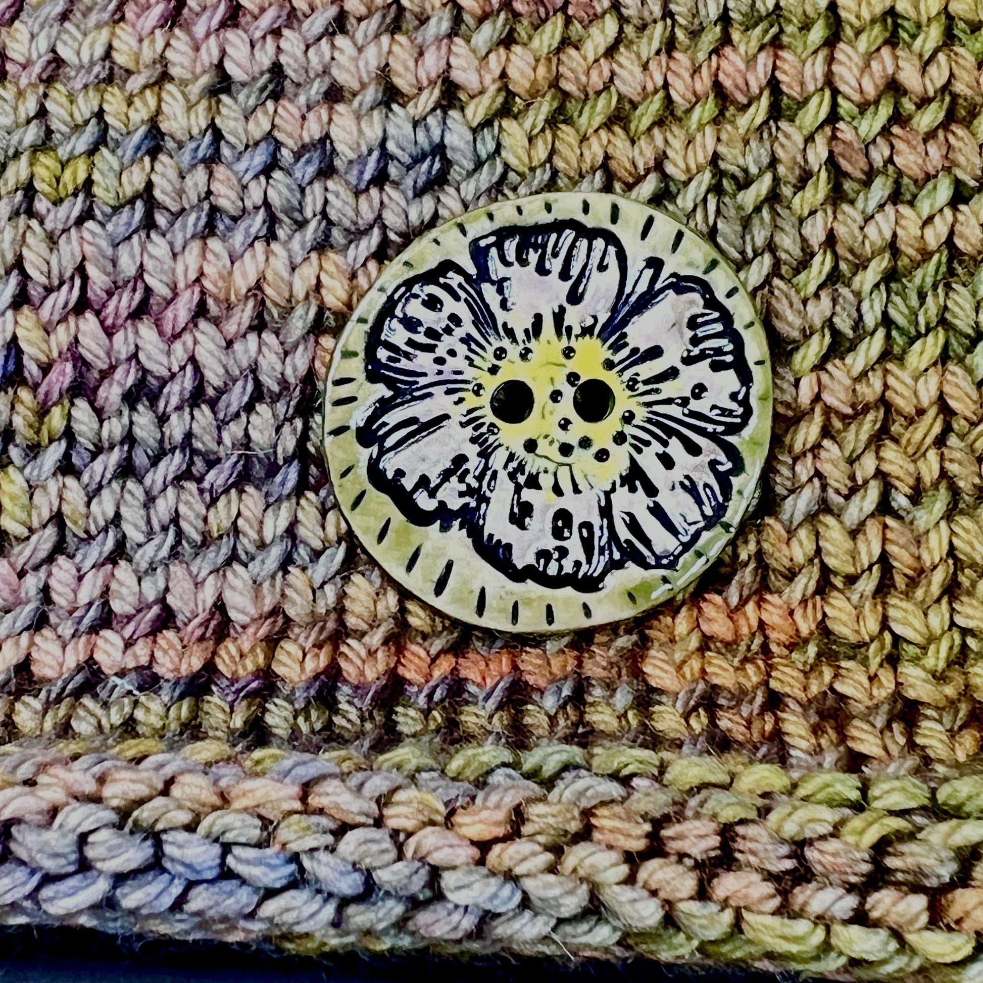 Large Button with Light Lavender Flower and Green Border