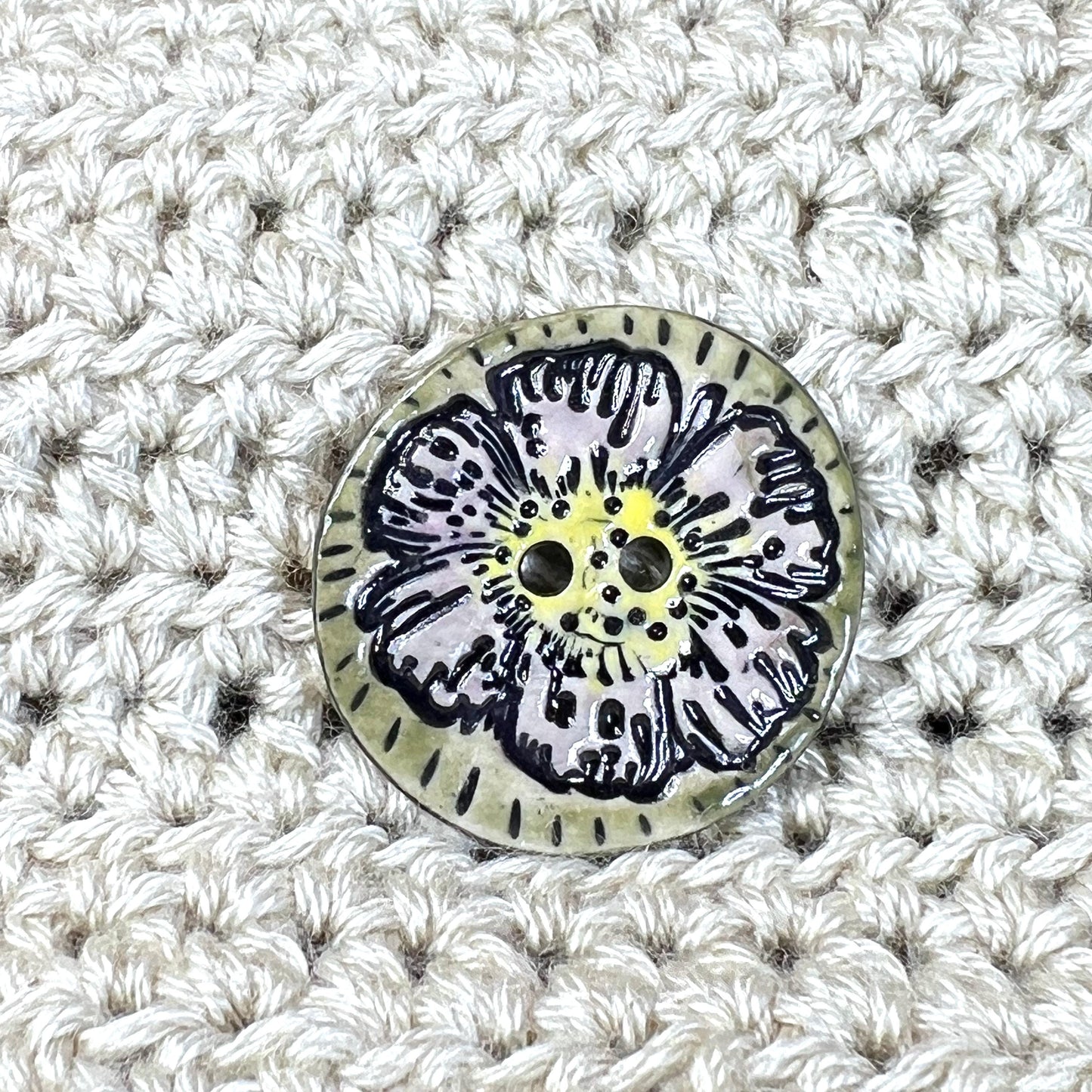Large Button with Light Lavender Flower and Green Border