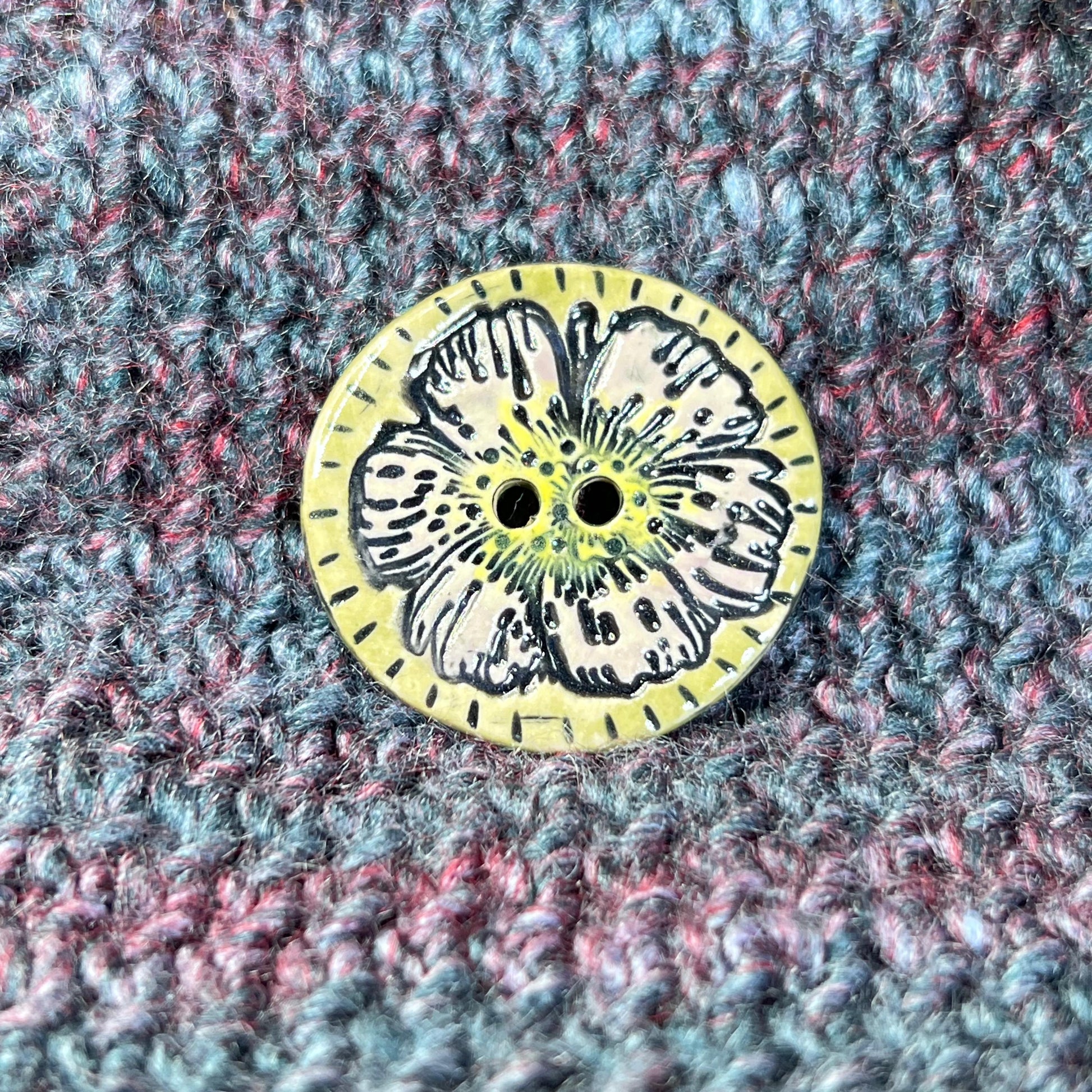 Large Button with Light Lavender Flower and Green Border