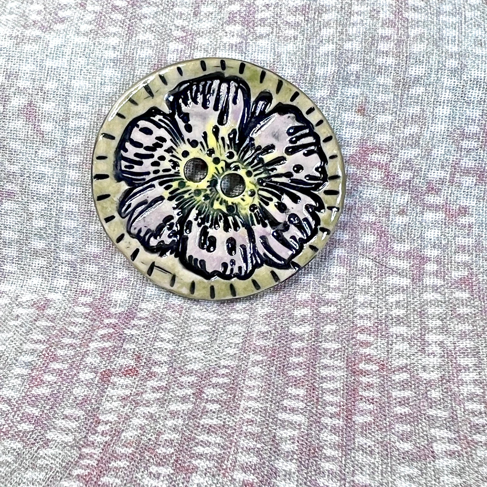 Large Button with Light Lavender Flower and Green Border