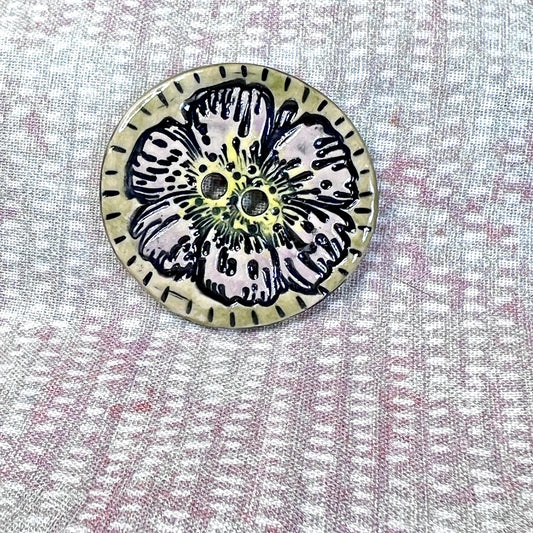 Large Button with Light Lavender Flower and Green Border