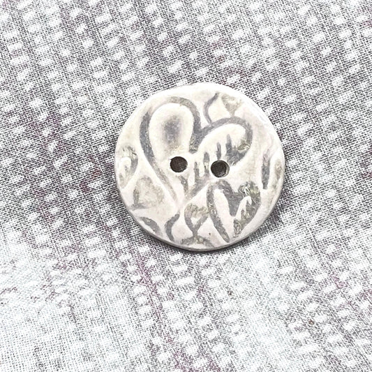 4 White Round Buttons with Light Gray Heart Pattern