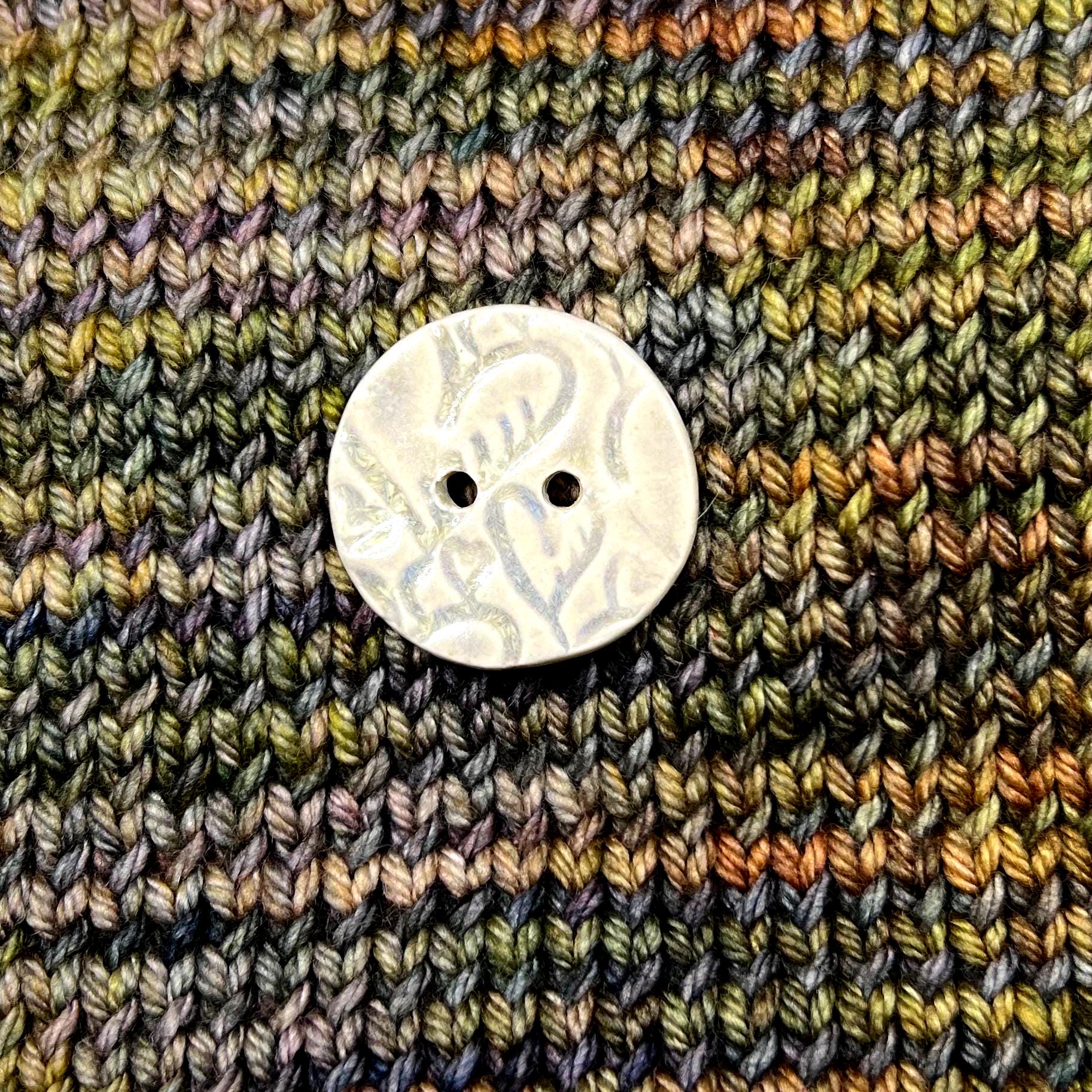 4 White Round Buttons with Light Gray Heart Pattern