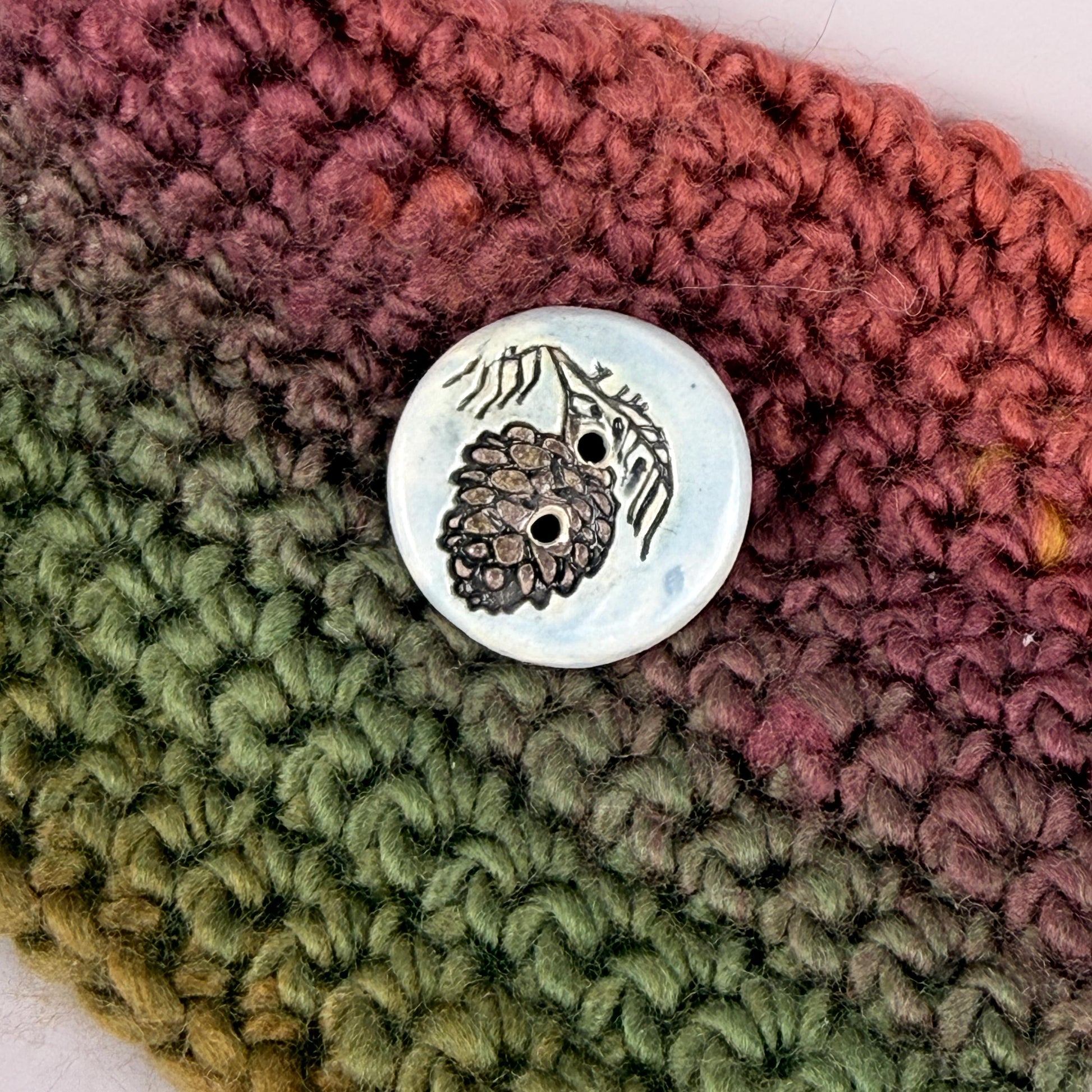 Pinecone with Pine Branch on Blue Round Ceramic Buttons