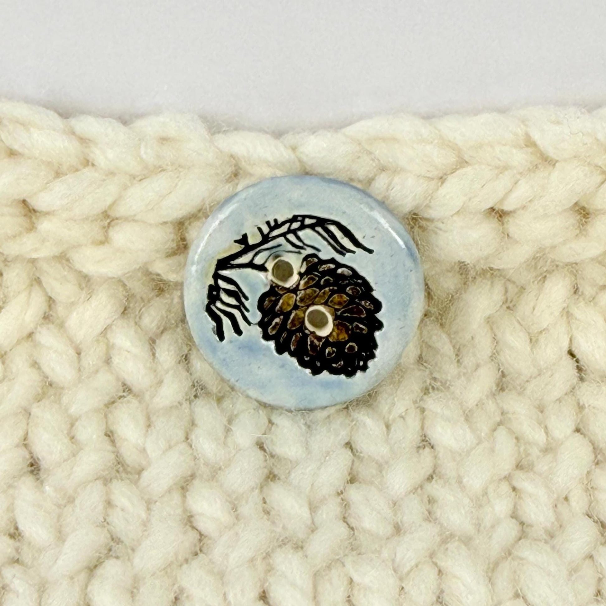 Pinecone with Pine Branch on Blue Round Ceramic Buttons