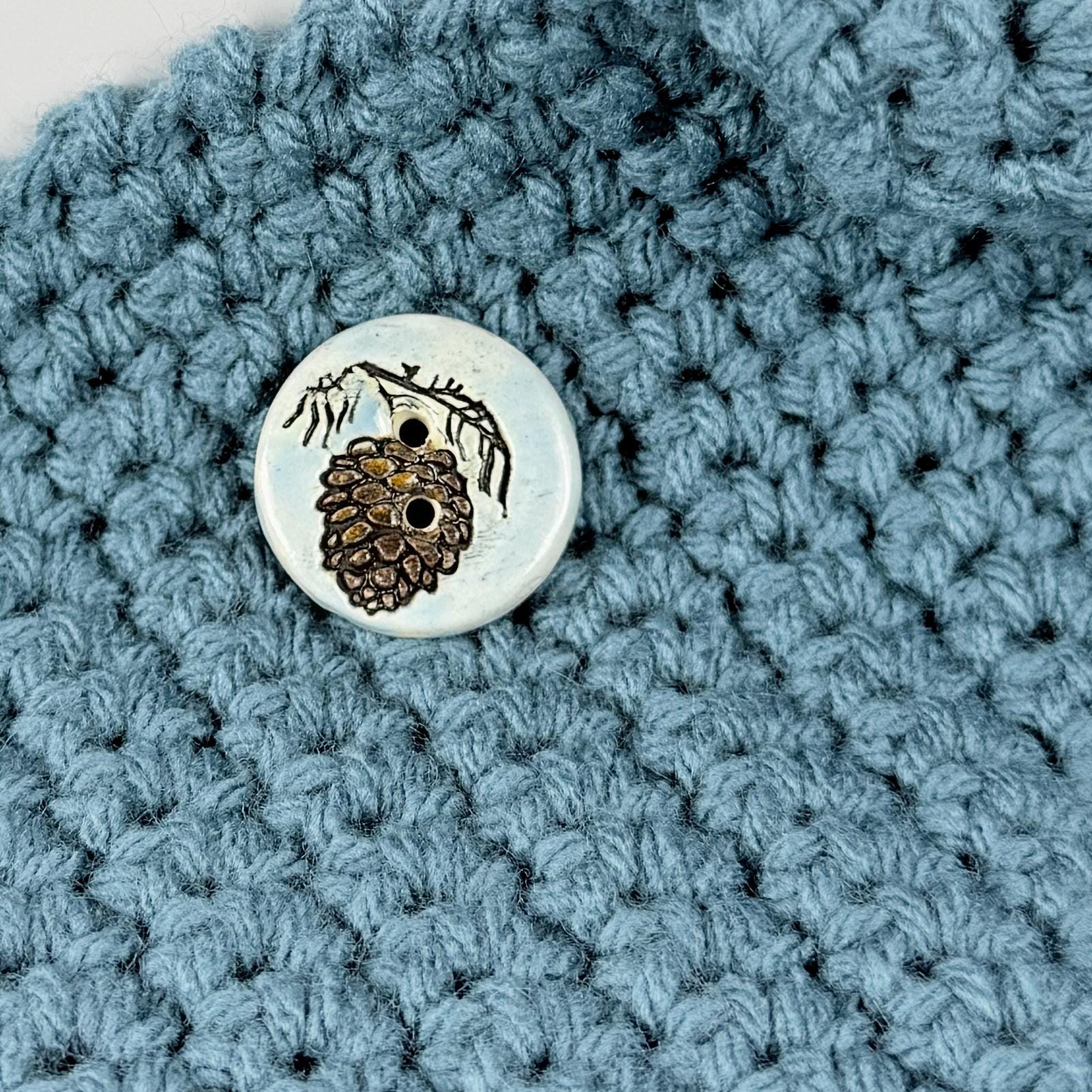 Pinecone with Pine Branch on Blue Round Ceramic Buttons