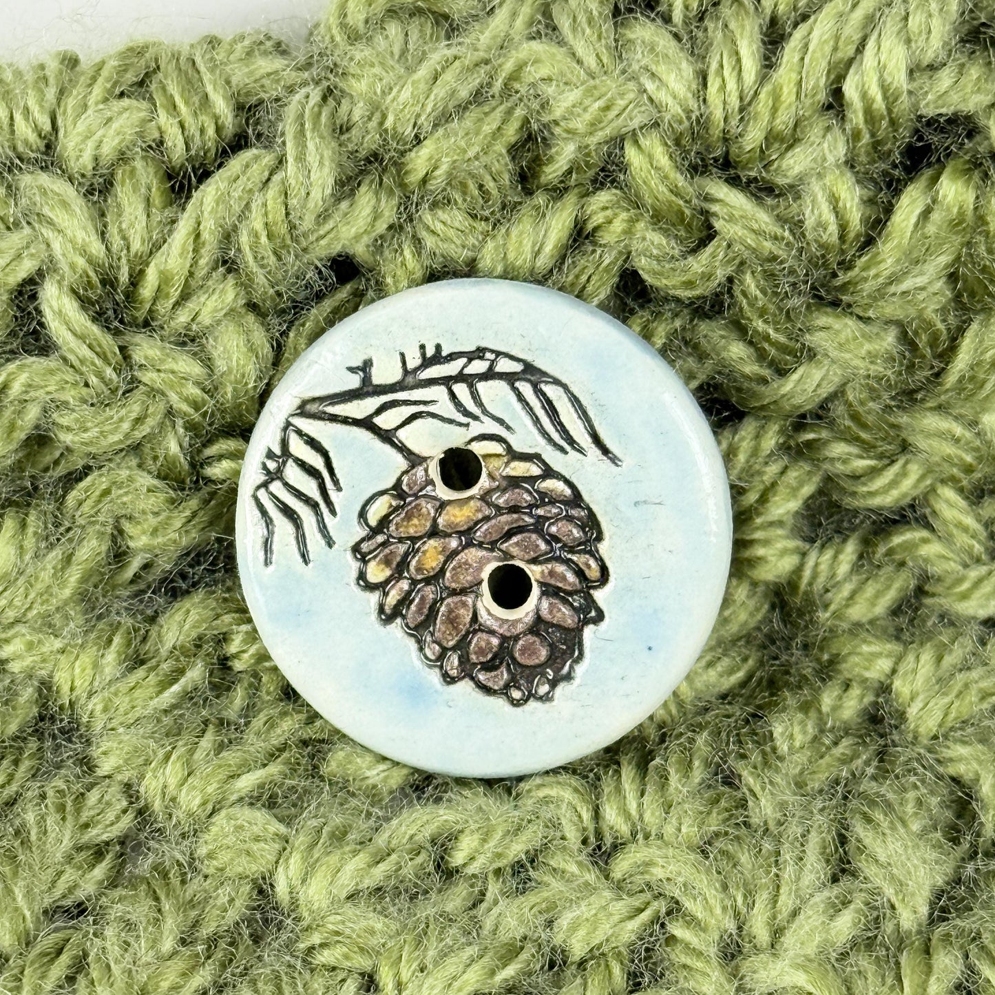 Pinecone with Pine Branch on Blue Round Ceramic Buttons