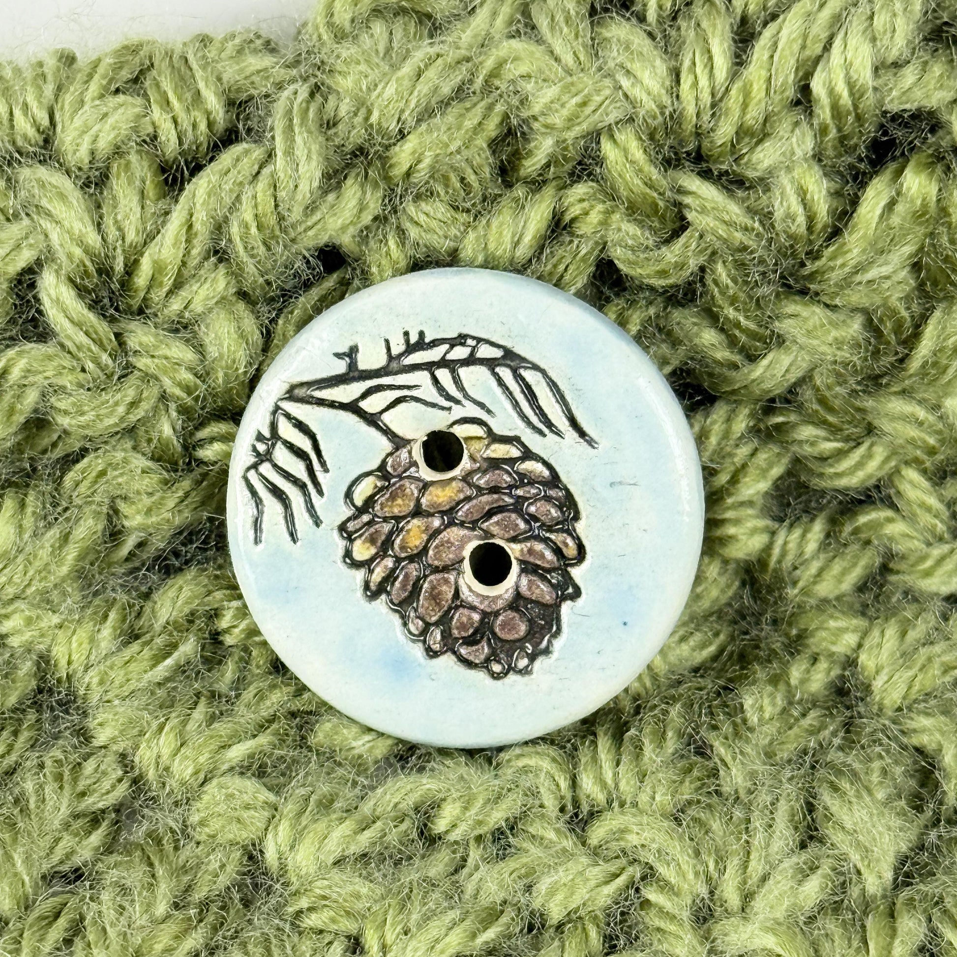 Pinecone with Pine Branch on Blue Round Ceramic Buttons