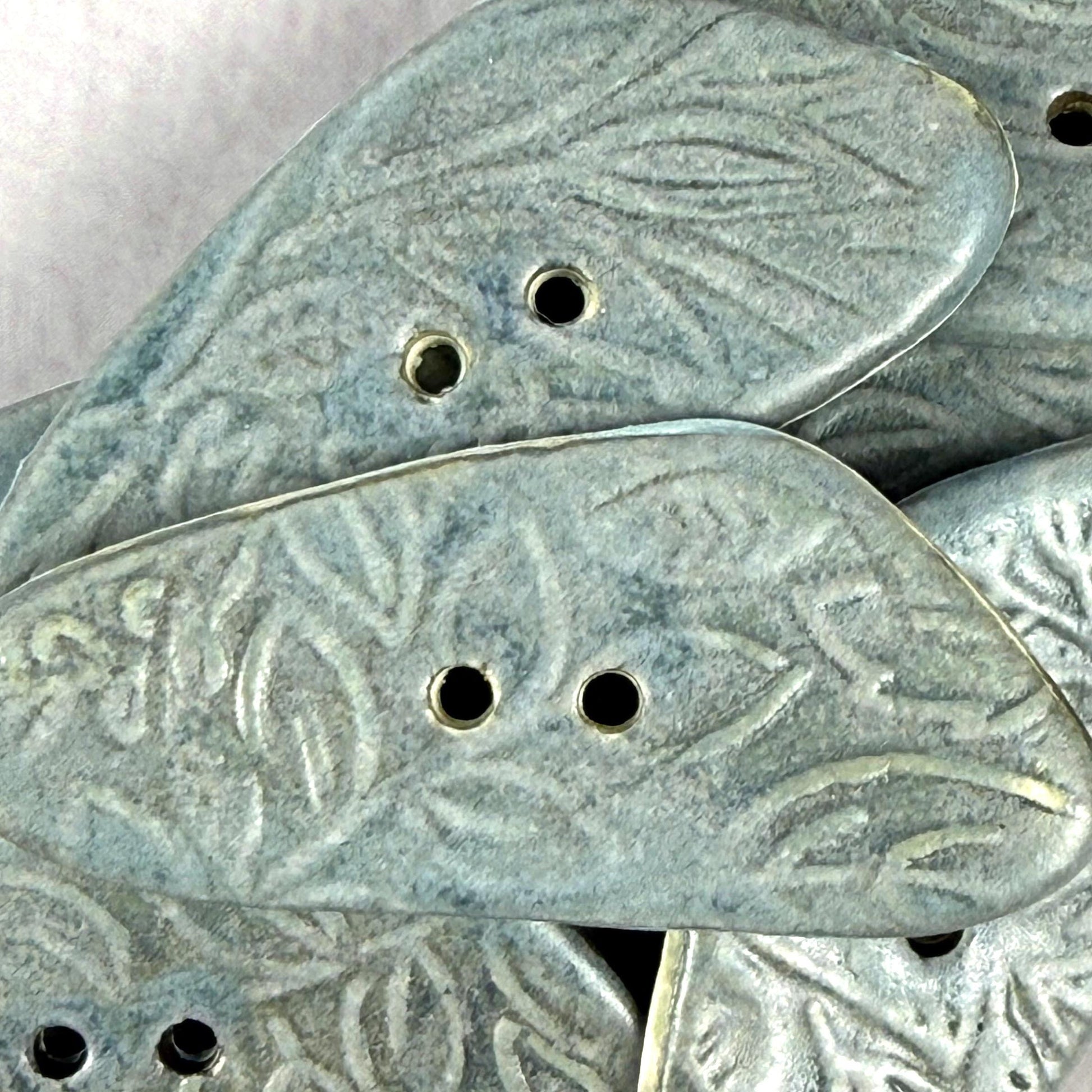 Blue Matte Triangular Button with Flower and Plant Texture