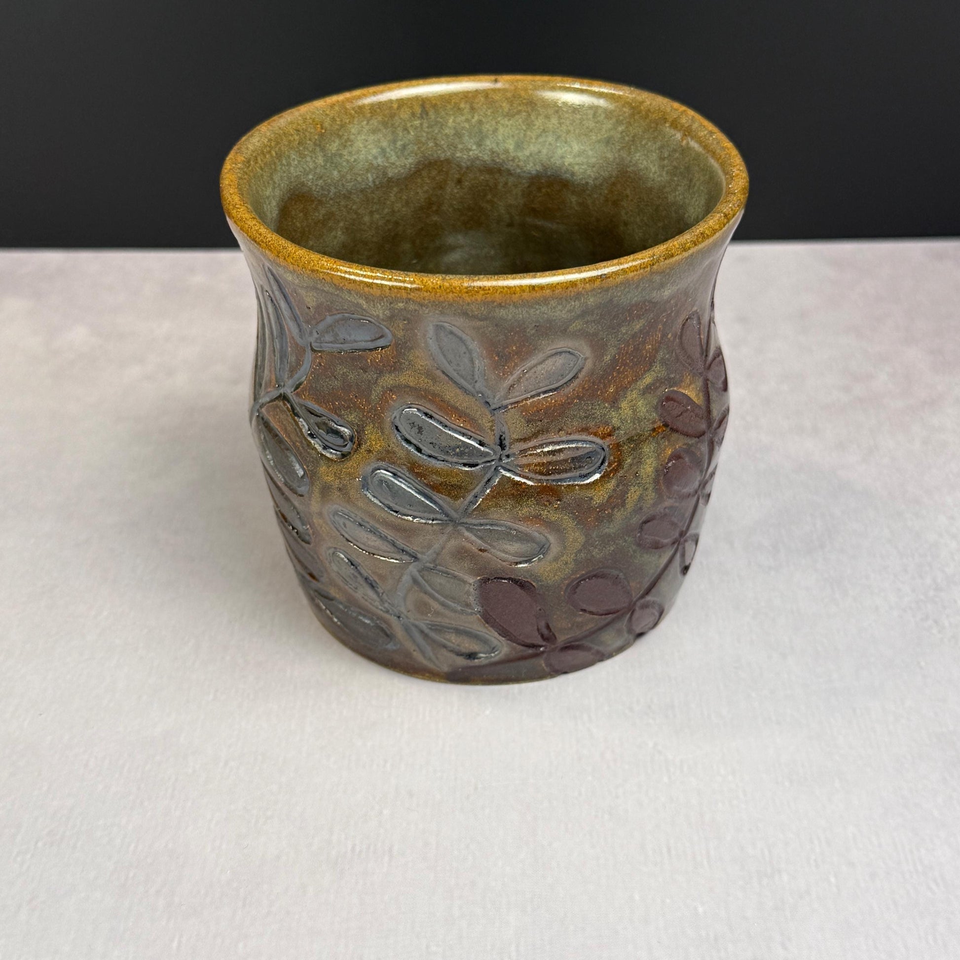 Brown Leaves on a Brown and Green Stoneware Pot/Desk Caddy