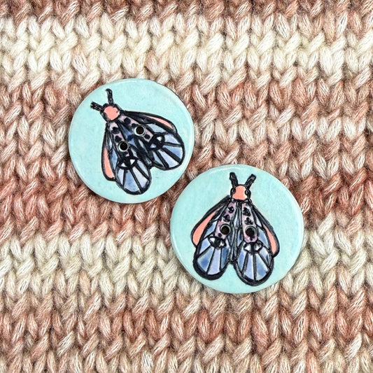 Blue Moth with Eyes on Aqua Blue Ceramic Button
