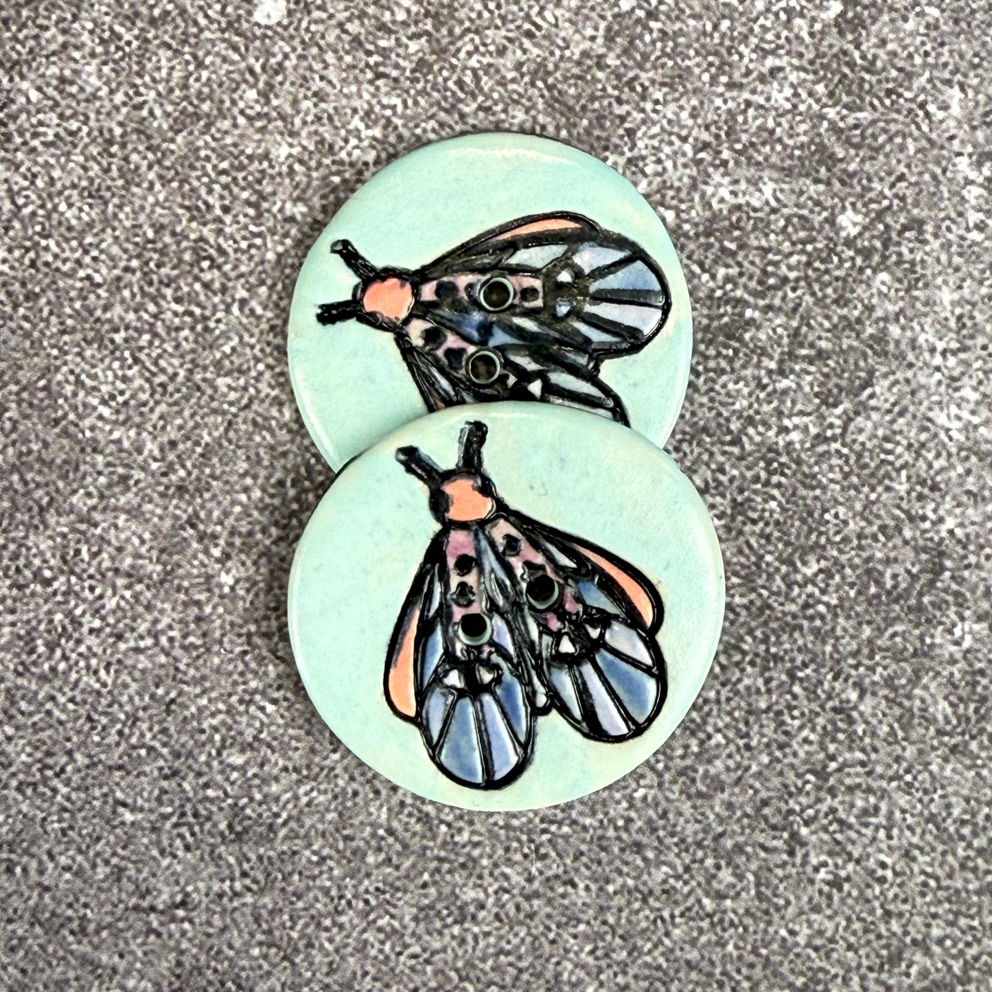 Blue Moth with Eyes on Aqua Blue Ceramic Button