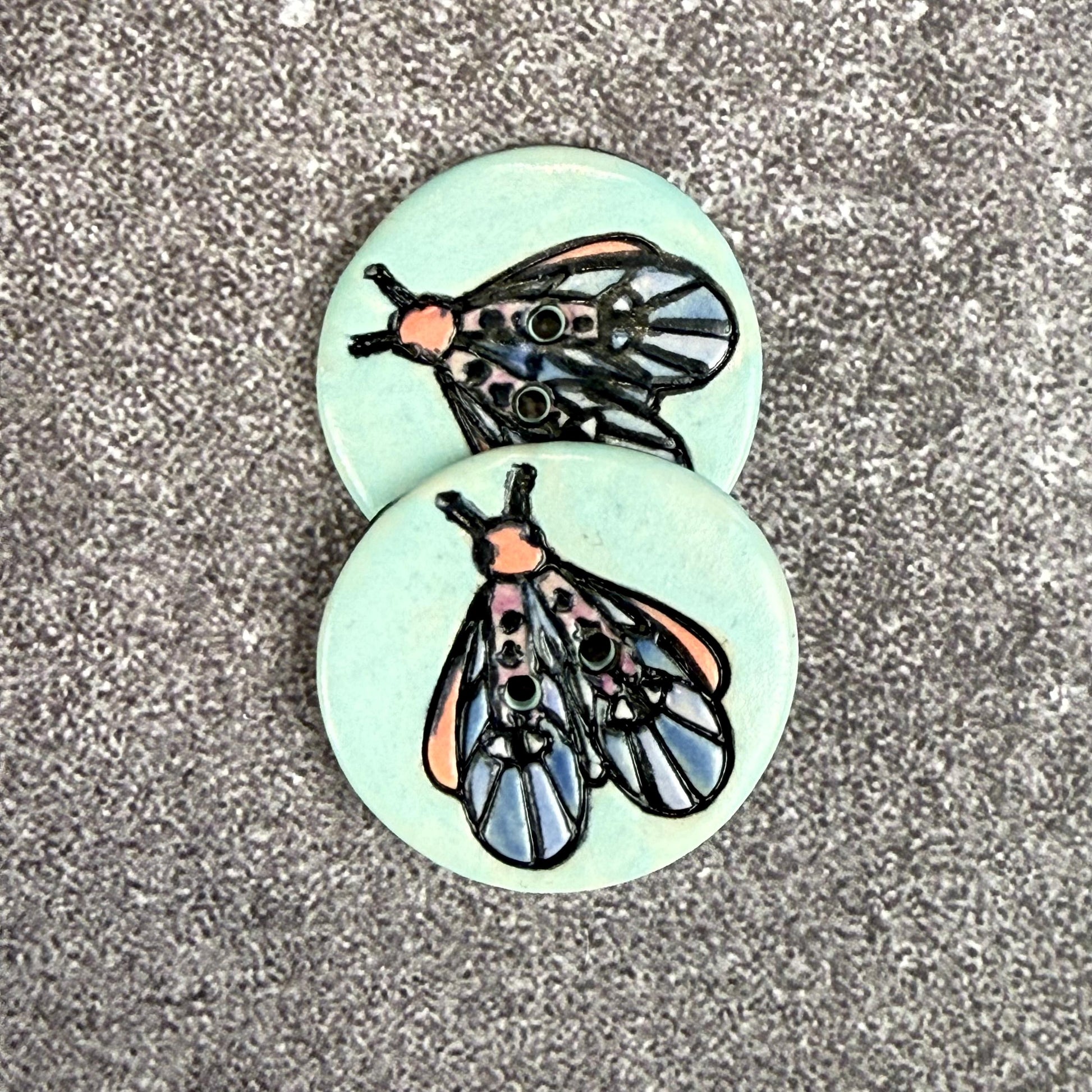 Blue Moth with Eyes on Aqua Blue Ceramic Button