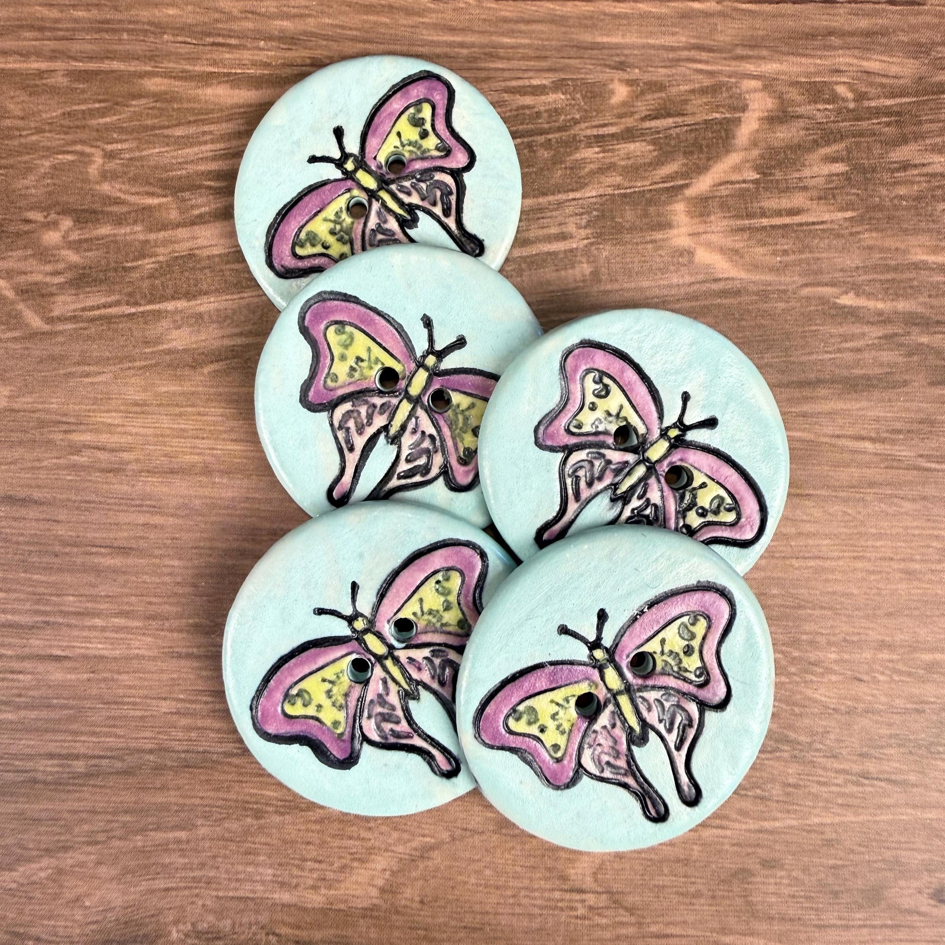 Red Violet Moth with Yellow on Aqua Blue Ceramic Button