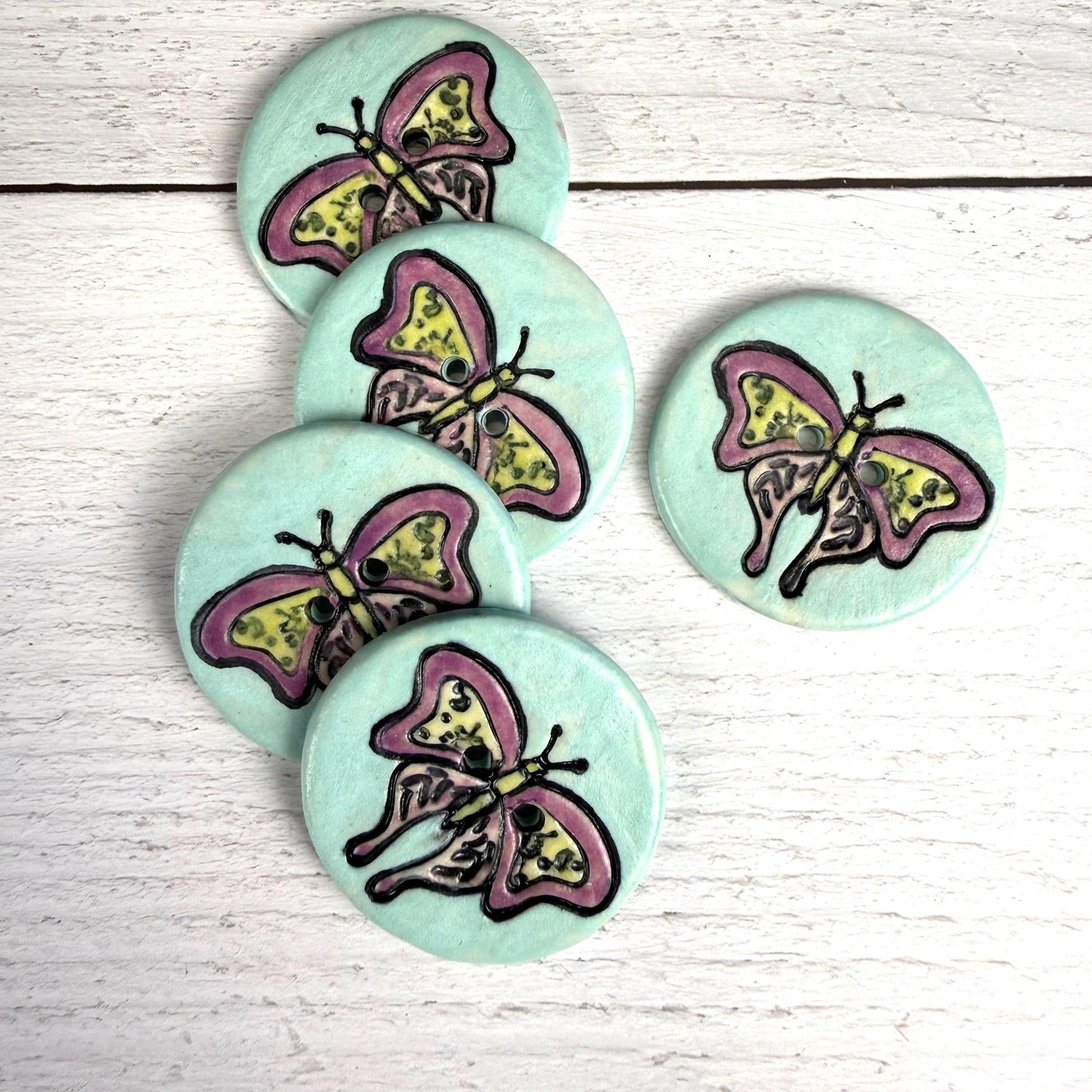 Red Violet Moth with Yellow on Aqua Blue Ceramic Button
