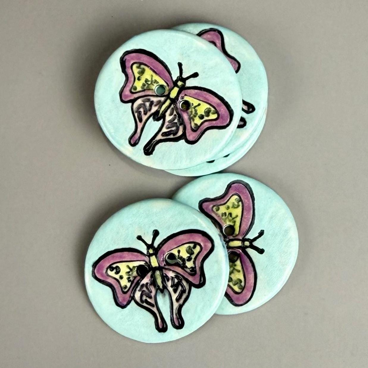 Red Violet Moth with Yellow on Aqua Blue Ceramic Button