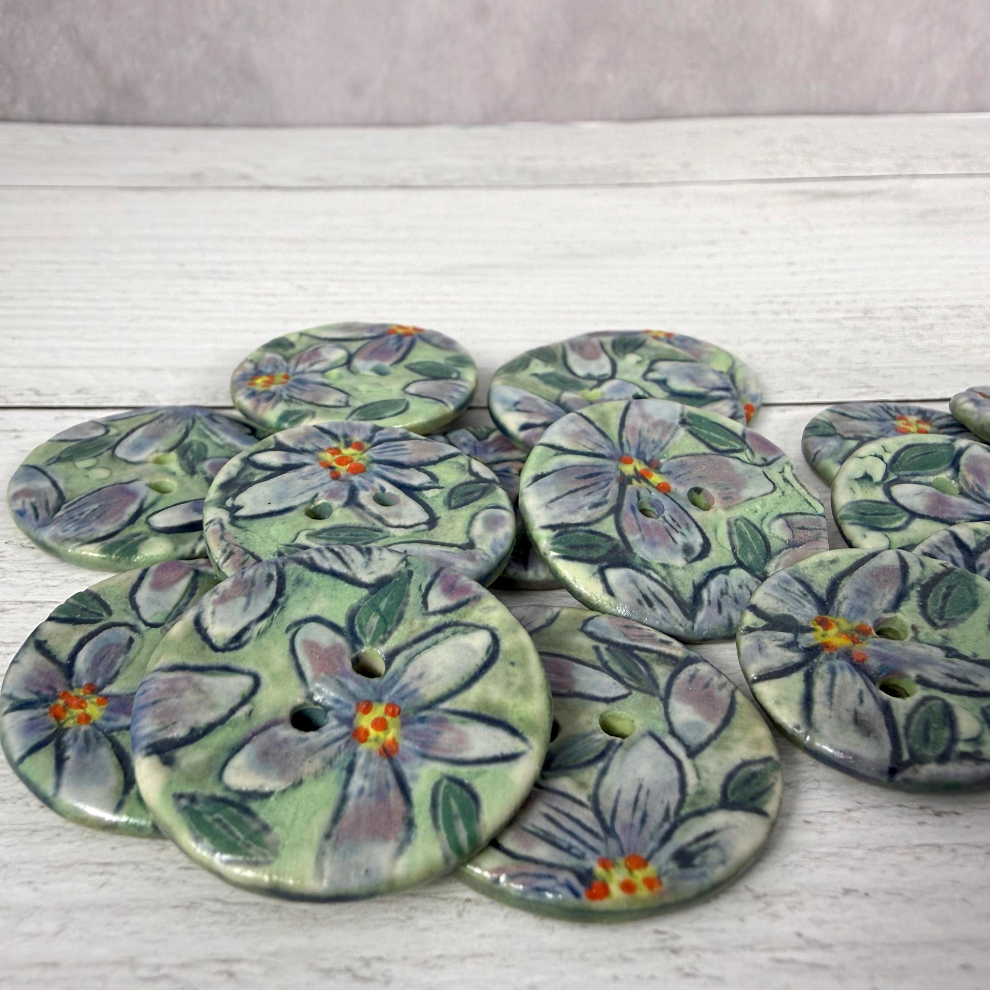 Purple Flowers on Green Round Buttons