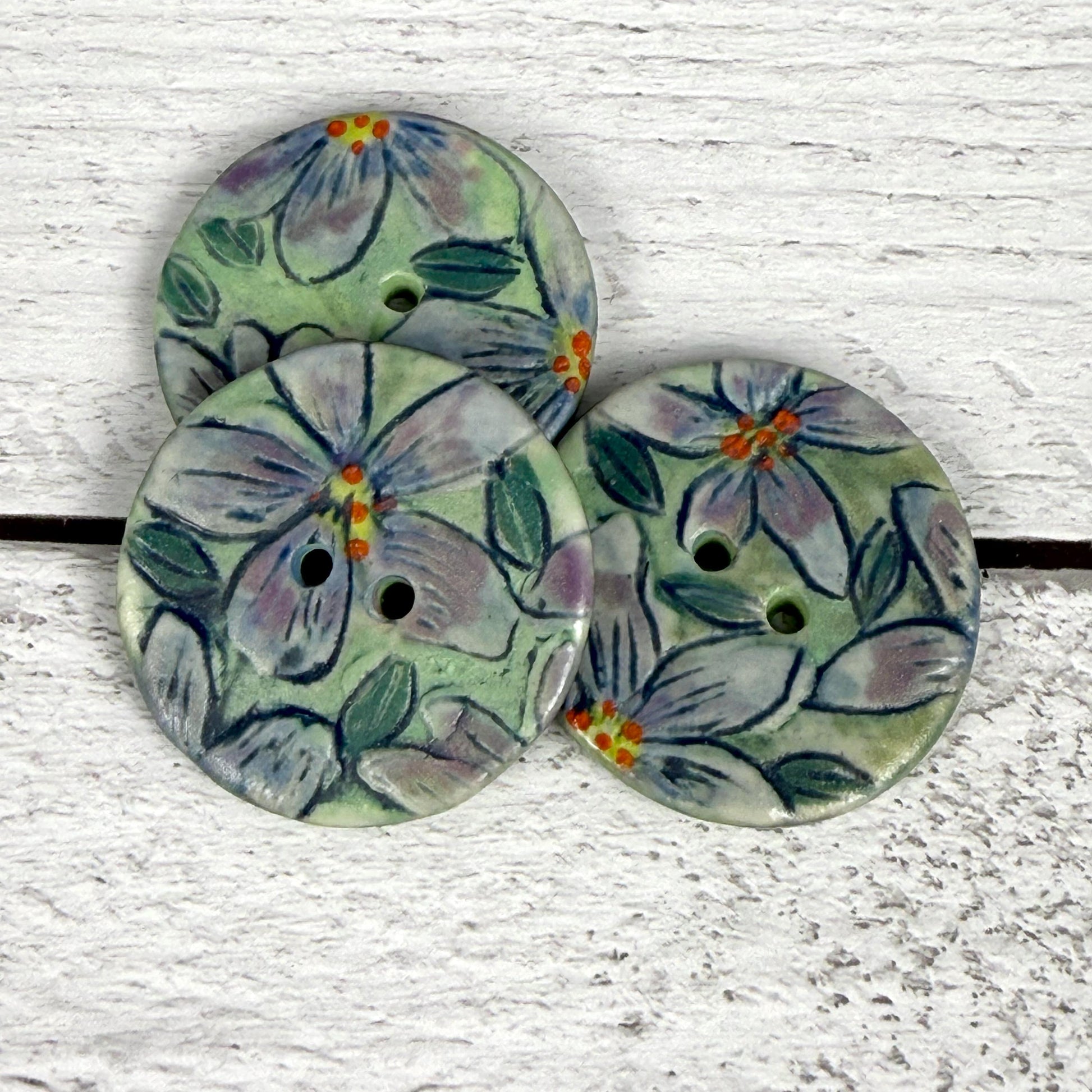 Purple Flowers on Green Round Buttons