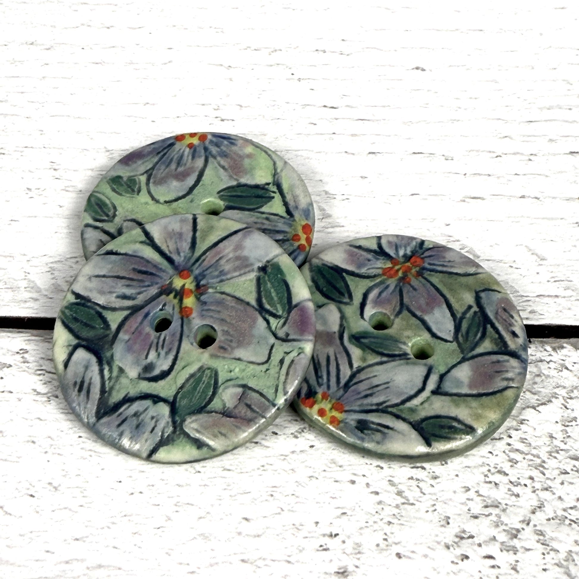 Purple Flowers on Green Round Buttons