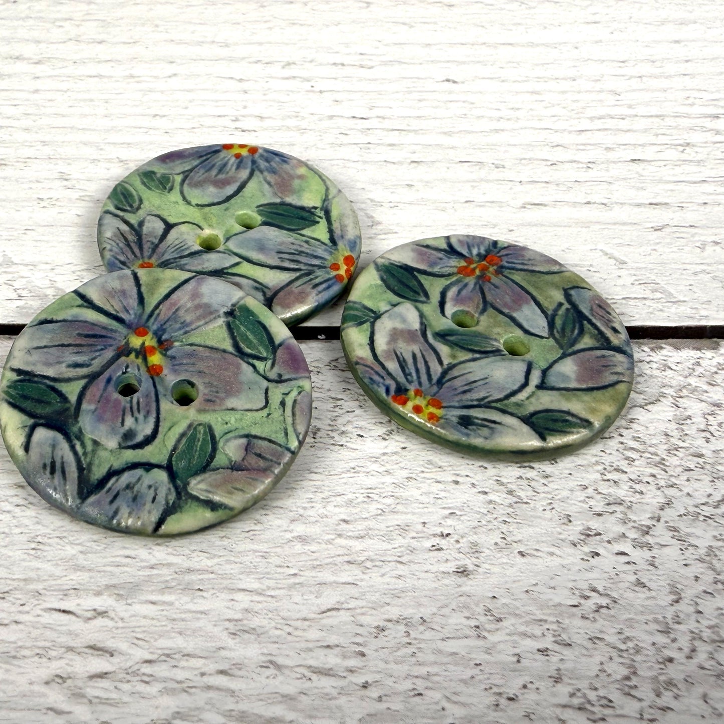 Purple Flowers on Green Round Buttons