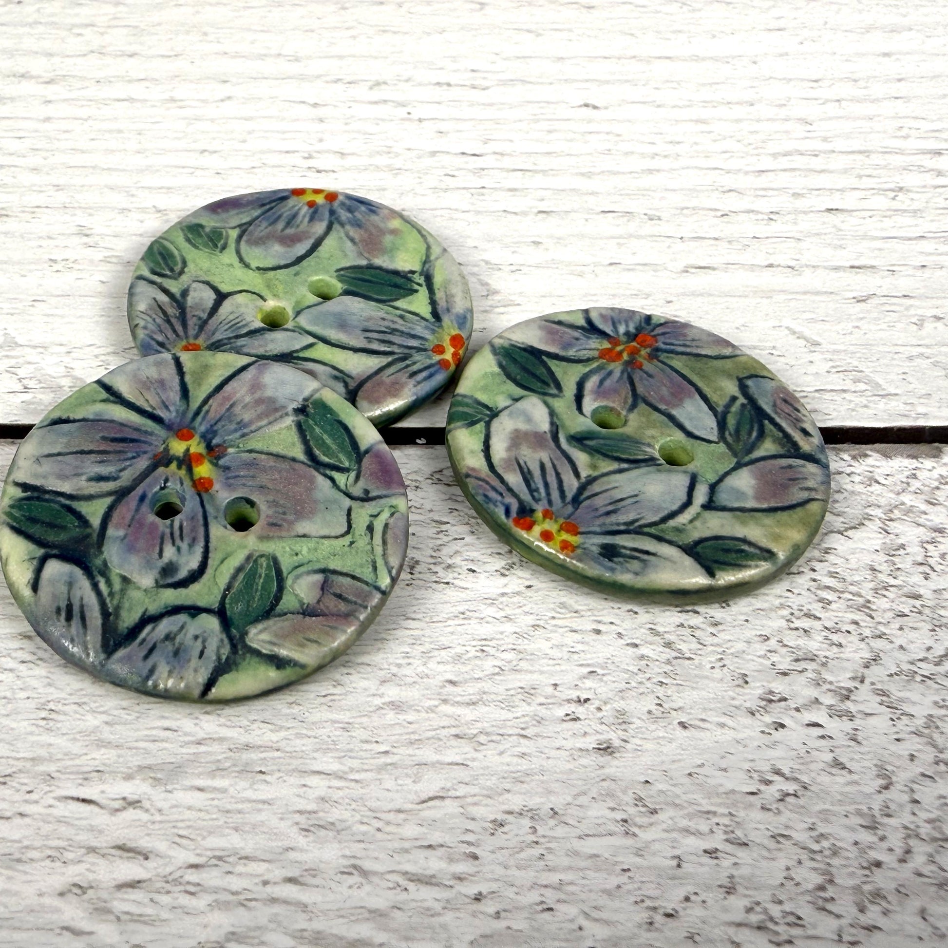 Purple Flowers on Green Round Buttons
